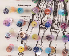 3D works on found book pages: 'Do No Harm'