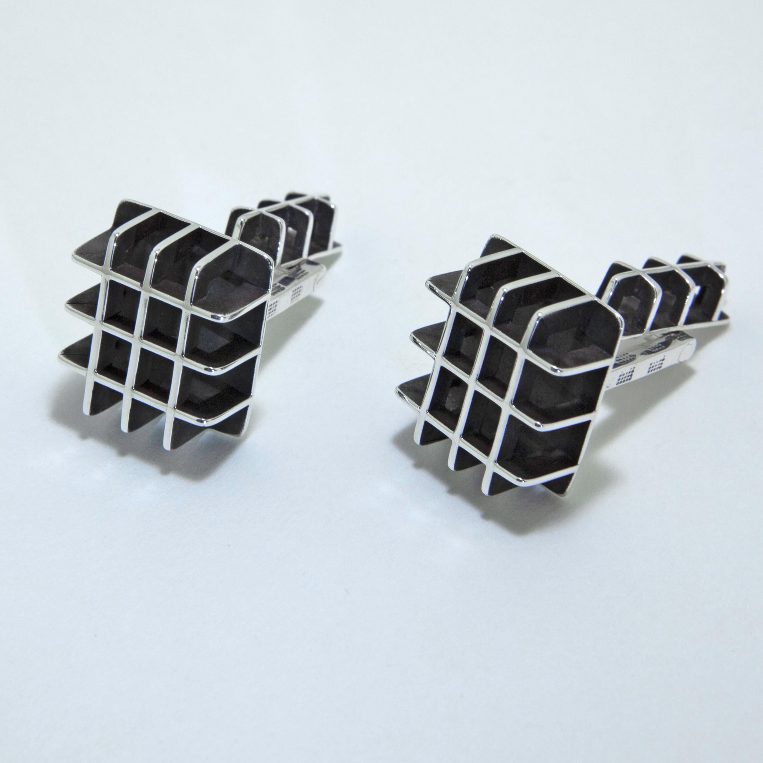 Architecture and Engineering coalesce in these elegant one of a kind Sterling Silver cufflinks.  Fabricated by hand;  I incorporated the Halved/Cross Lap joinery method for the intersecting points to create the open grid structure.  Elevated with a
