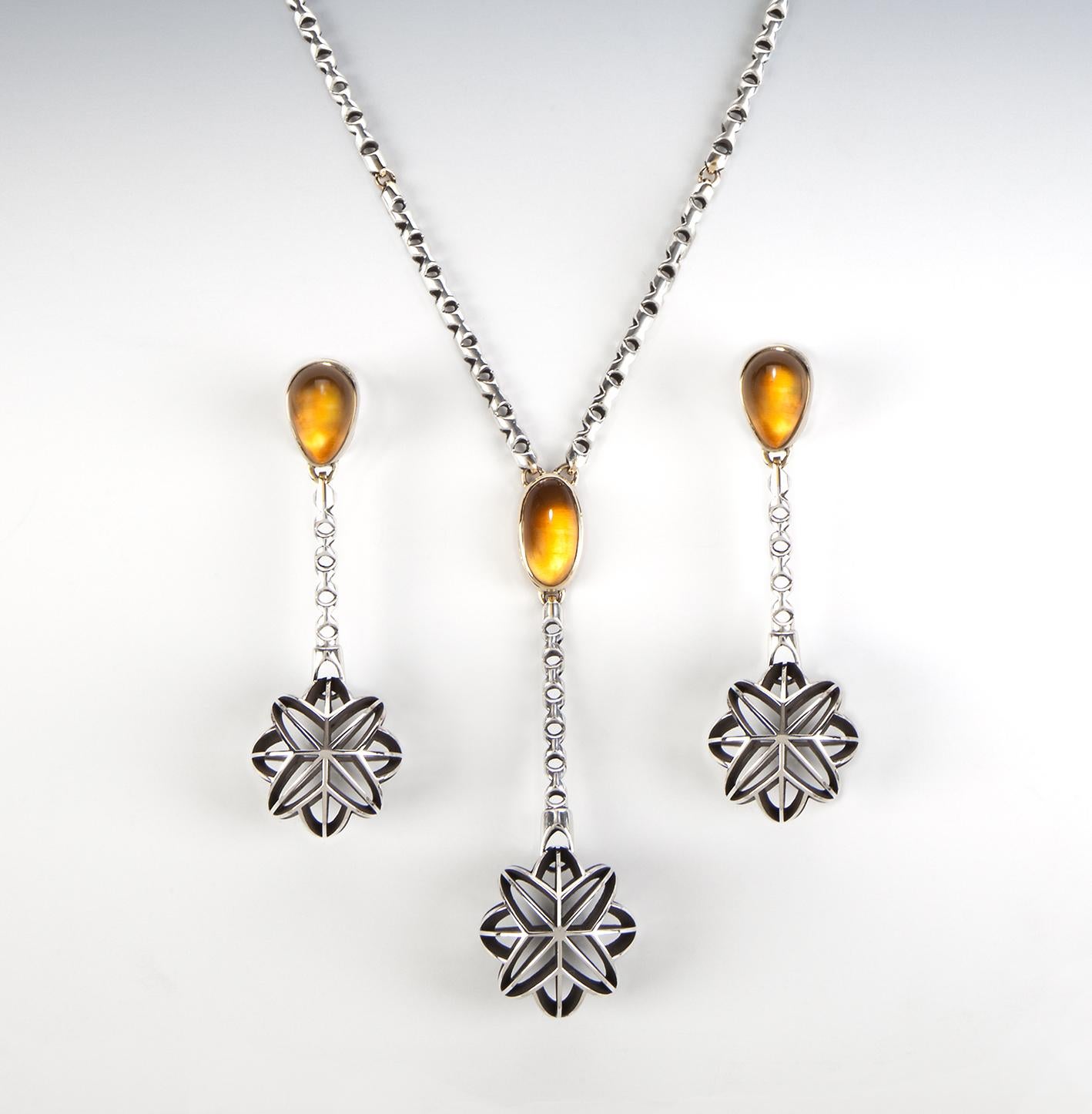Sterling Silver and Gold necklace and matching earrings with custom cut Citrine cabochons.  From the 2019 Saul Bell Design Awards winning collection entitled 'Sunshine and Shadow'.  Hand fabricated chain in Sterling Silver with Gold linkages, custom