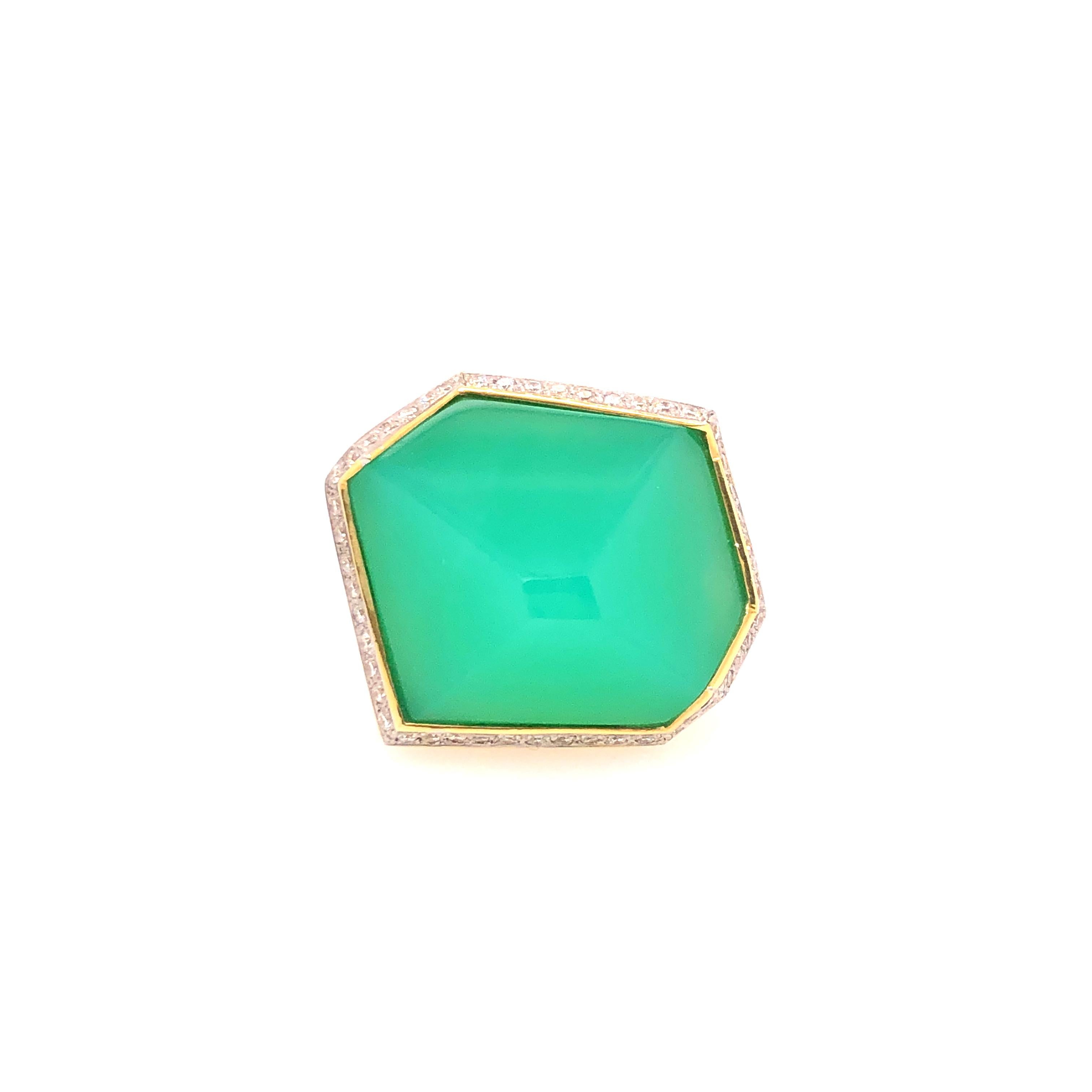 Extraordinary, Valerie Naifeh's 17.36 CT Green Chrysoprase Diamond ring is only for those looking to stand out! The large irregular shape Chrysoprase is bezel set into the 18K yellow gold ring with a border of diamonds outlining it.

Valerie Naifeh
