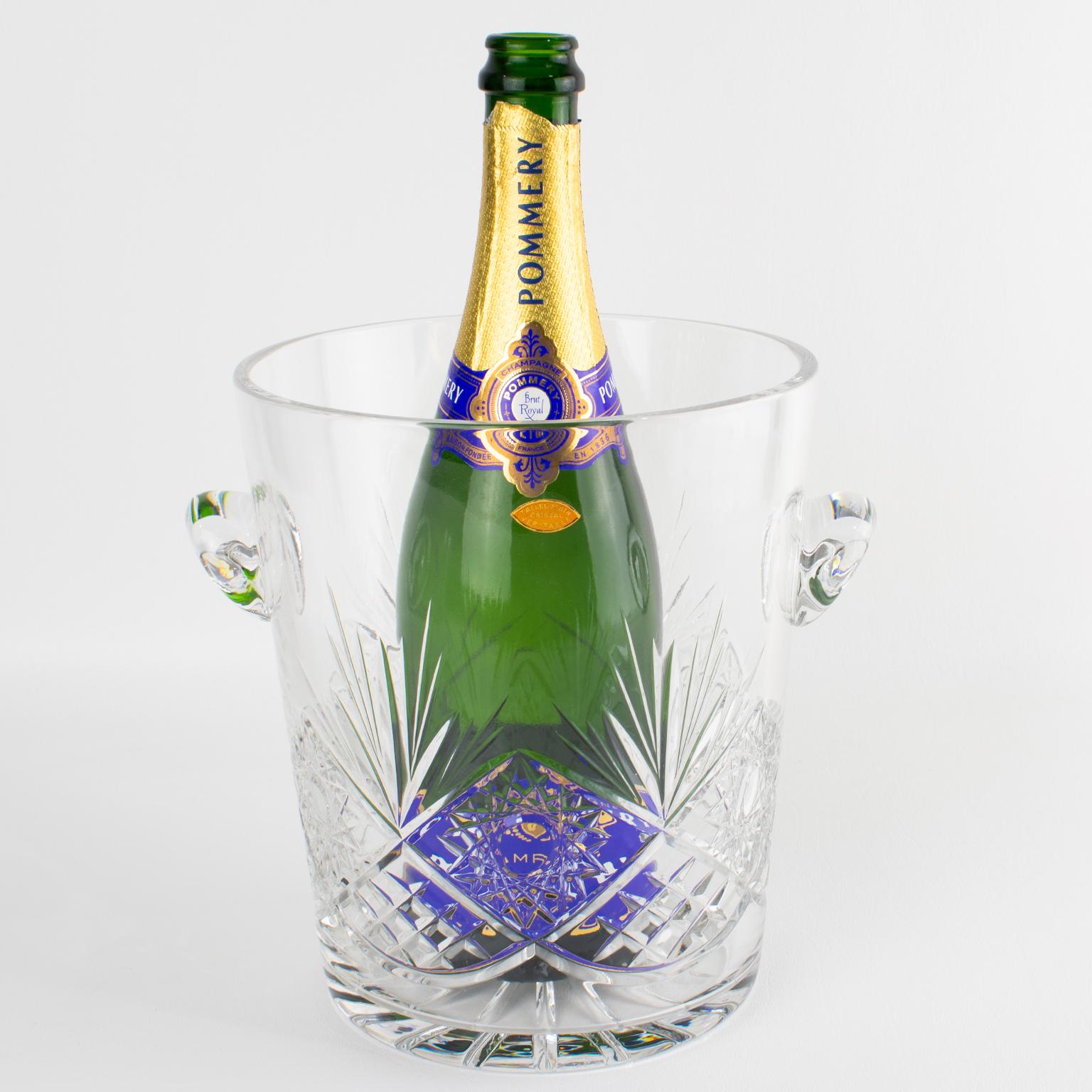 Boost your entertaining experience with this exceptional Baccarat champagne ice bucket or wine cooler—a true testament to refined craftsmanship and timeless elegance. Designed by the renowned Valéry Klein and crafted by Cristallerie Bertrichamps in