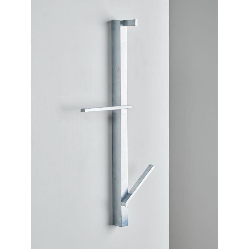 Valet Coat Hanger, Natural / Raw by Atelier Ferraro
Dimensions: L35 x W65 x H7 cm
Materials: Recycled Aluminium

Also available: ivory and pastel turquoise colors,

„THE FORM FOLLOWS THE REST“: In a future where raw materials won't be as