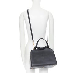 VALEXTRA black leather dual front pocket gold tone top handle shoulder bag