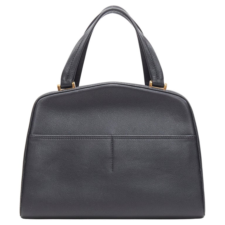 VALEXTRA black leather dual front pocket gold tone top handle handbag at  1stDibs