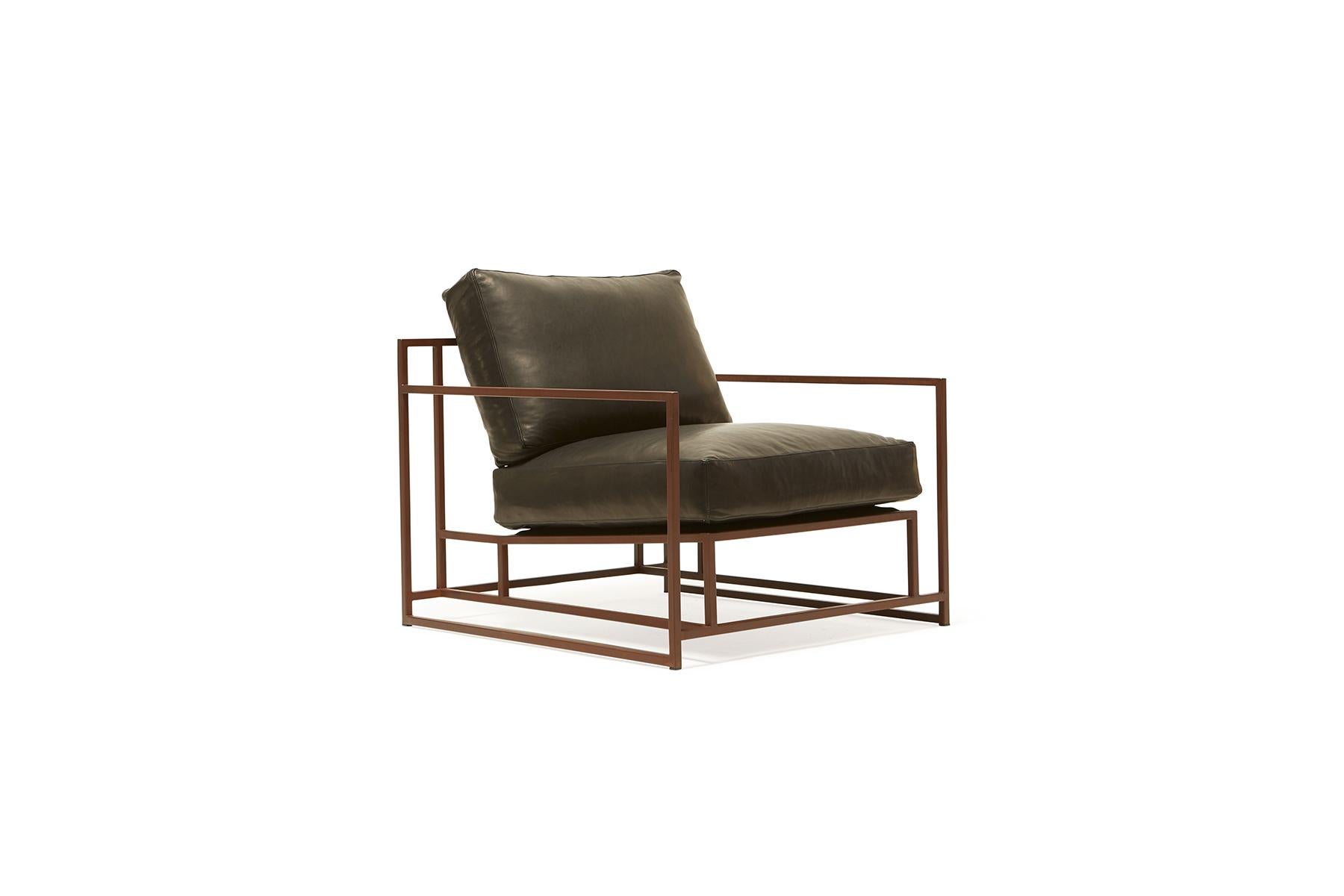 The Inheritance Armchair by Stephen Kenn is as comfortable as it is unique. The design features an exposed construction composed of three elements - a steel frame, plush upholstery, and supportive belts. The deep seating area is perfect for a