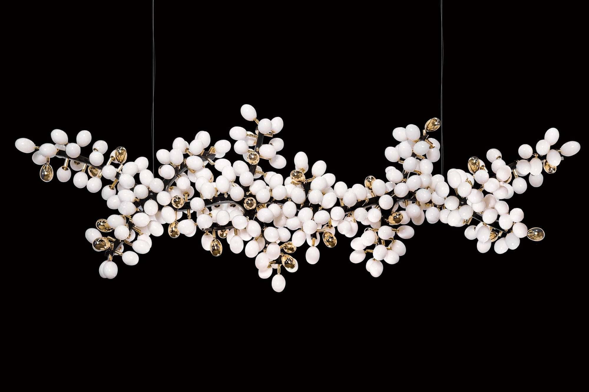 The spectacular Valiant Chandelier by Barlas Baylar is inspired by the resplendent natural forms of ancient flora. The Valiant Collection is rigorously crafted in hand-blown Murano glass and solid sculpted bronze (or stainless steel.)