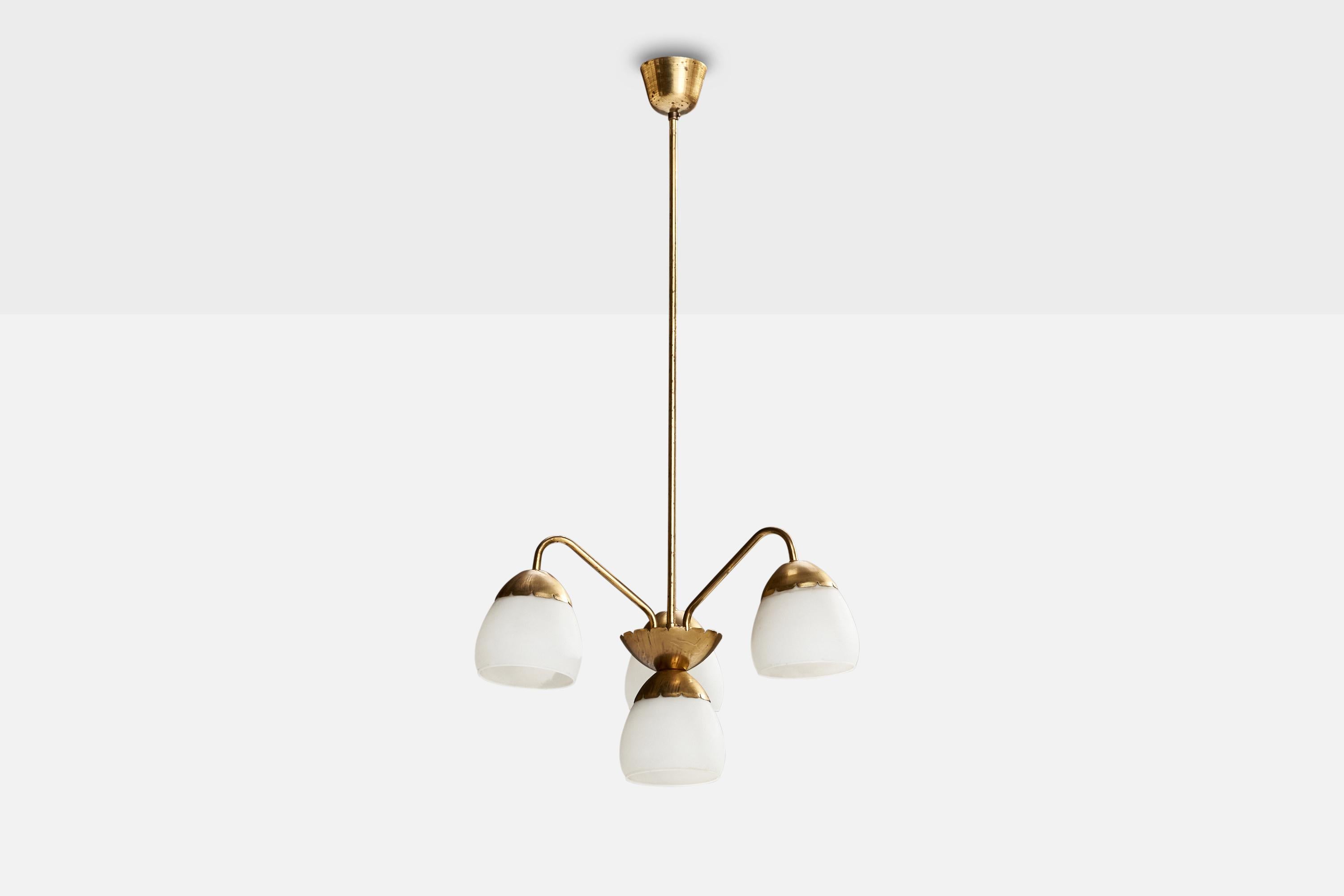 A brass and opaline glass chandelier designed and produced by Valinte OY, Finland, 1950s.

Dimensions of canopy (inches): 2.75” H x 3.36” Diameter
Socket takes standard E-26 bulbs. 4 socket.There is no maximum wattage stated on the fixture. All