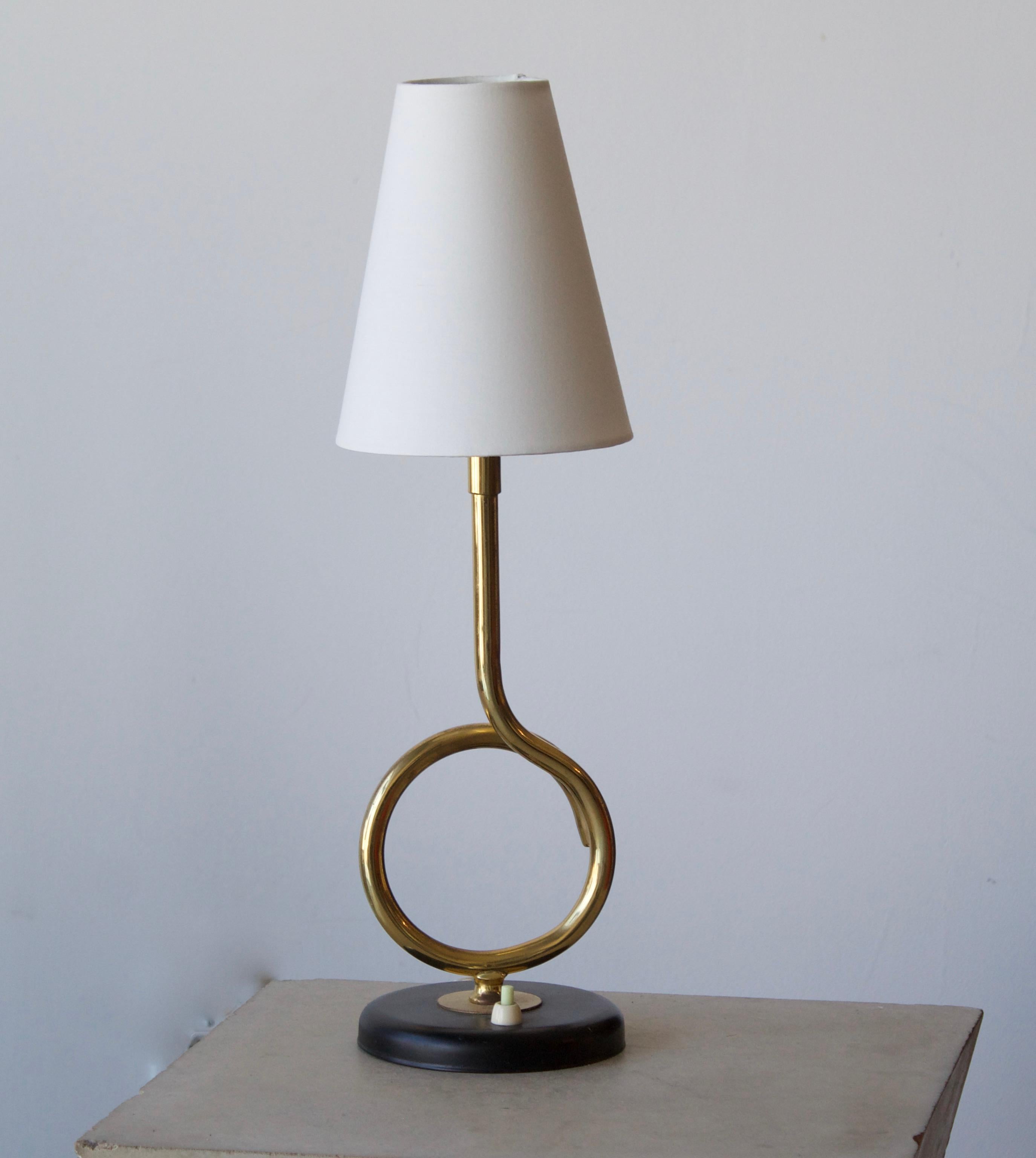 A table lamp by Valinte Oy. In brass, lacquered metal, brass, brand new lampshade. Stamped

Other designers of the period include Josef Frank, Paavo Tynell, Hans Bergström, Böhlmarks, and Jean Royère.