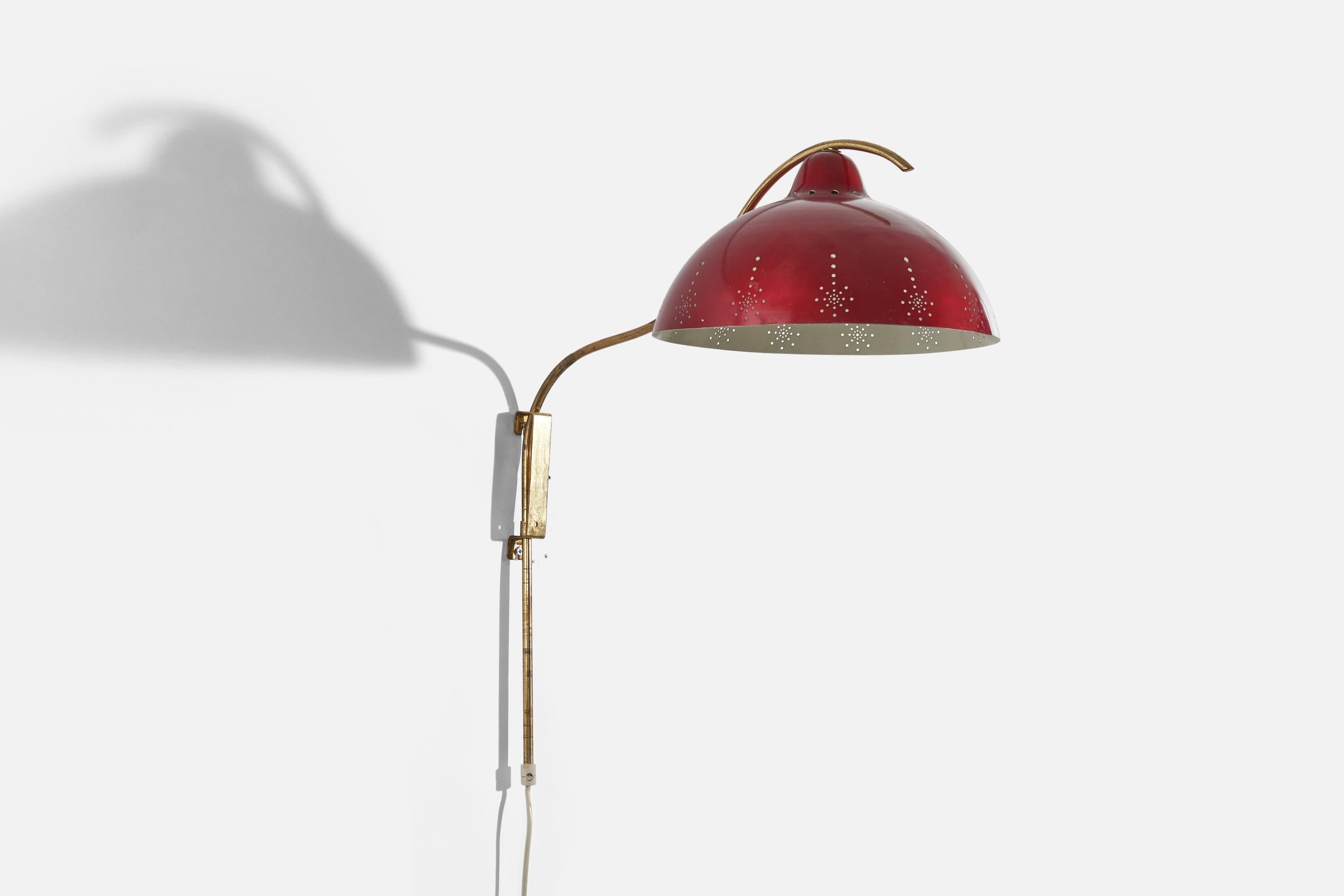 A brass and red metal wall light designed and produced by Valinte OY, Finland, 1940s. 

Dimensions of back plate (inches) : 4.87 x 1 x 0.6 (H x W x D).