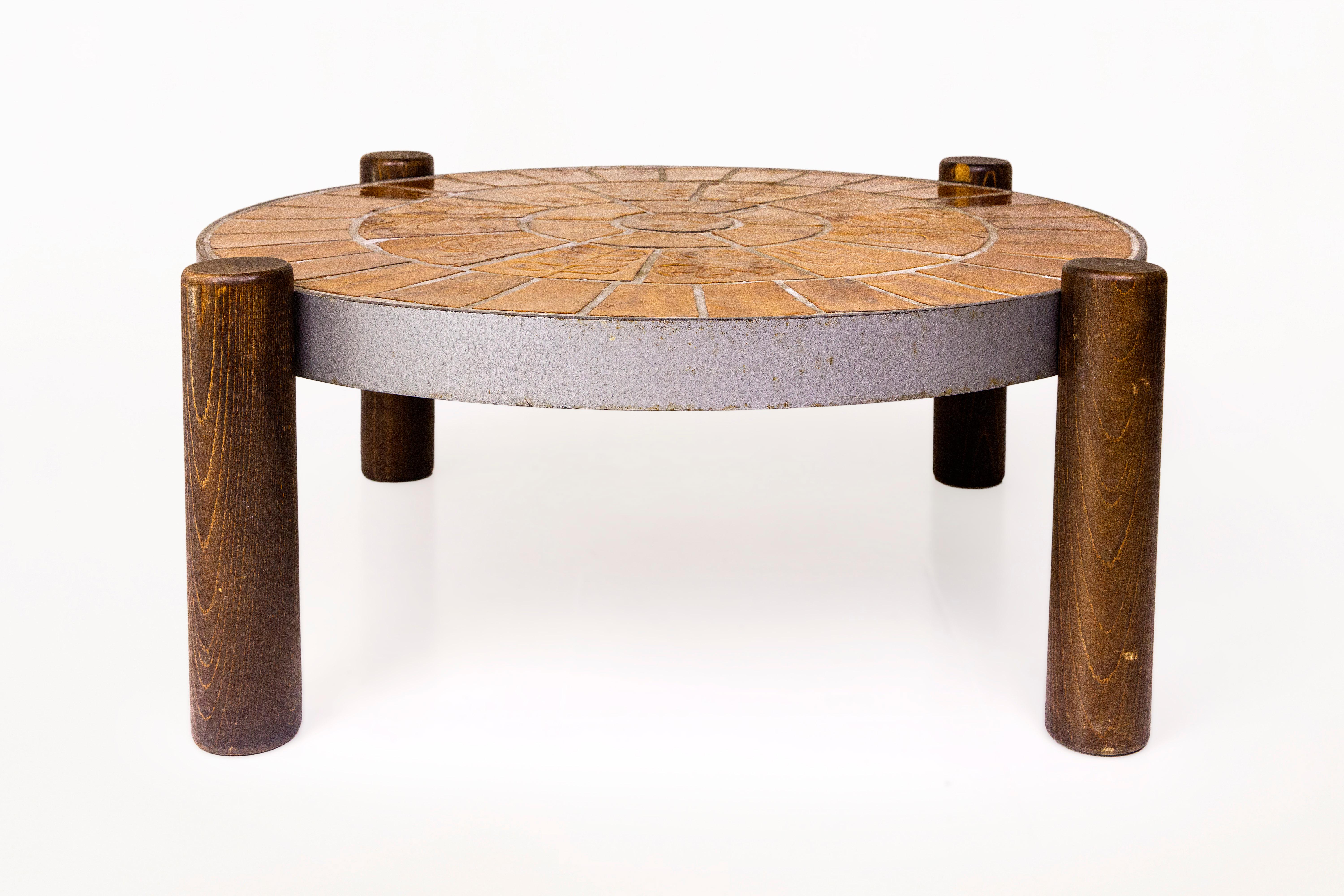 Vallauris coffee table.
Ceramic tiles. 
Wood base with iron frame,
circa 1960. France.
Good vintage condition.
Vallauris is a commune in the Alpes-Maritimes department in the Provence-Alpes-Côte d'Azur region in southeastern France. In 1948