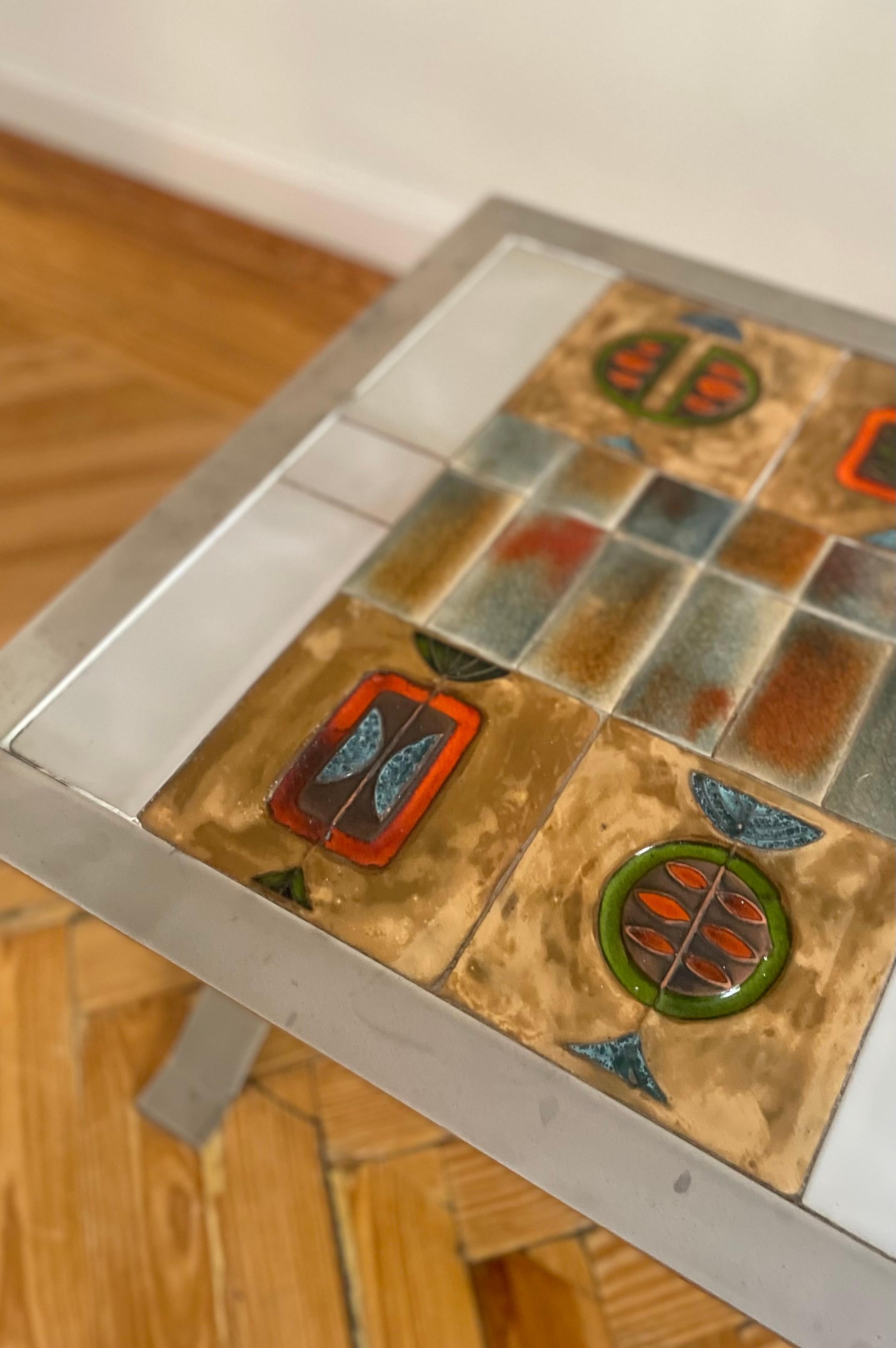 Table with ceramic top of Vallauris and structure designed by Sir Terence Conran. France, 1970s.

Length: 115cm
Width: 54cm
Height: 33cm

Sir Terence Conran (1931-2020) British designer and entrepreneur, founder of Conran Design Group and Habitat,