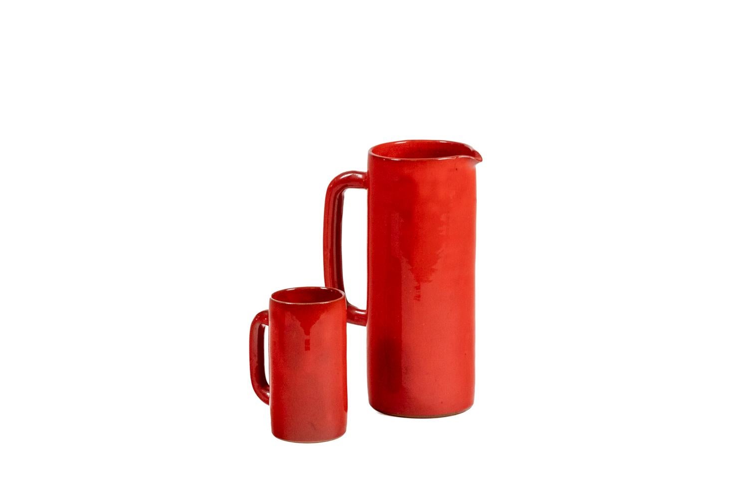 Vallauris, signed.

Ceramic coffee service, enamelled terracotta, red, consisting of a pitcher, two cups and their saucers and a large cup. Signed hollow Vallauris.

French work realized in the 1970s.

Dimensions:

Carafe : H 25 x L 10,5 x P