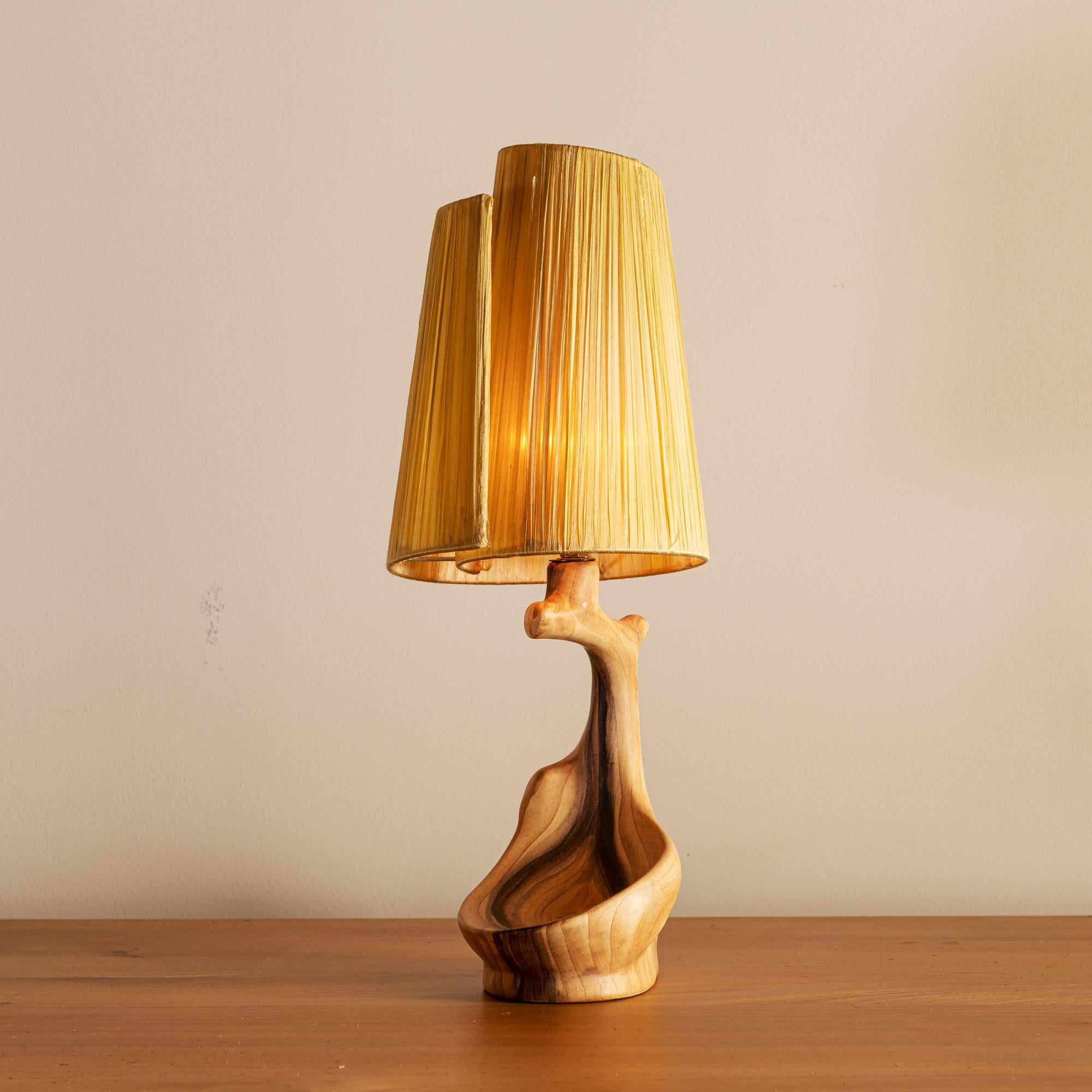Organic and charming Vallauris table lamp in faux bois glaze with spiral shade, inscribed on underside, France, 1950s.