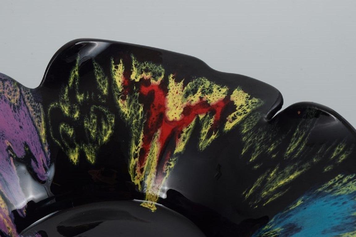 Mid-20th Century Vallauris, France, Ceramic Bowl in Brightly Colored Glazes on a Black Base For Sale