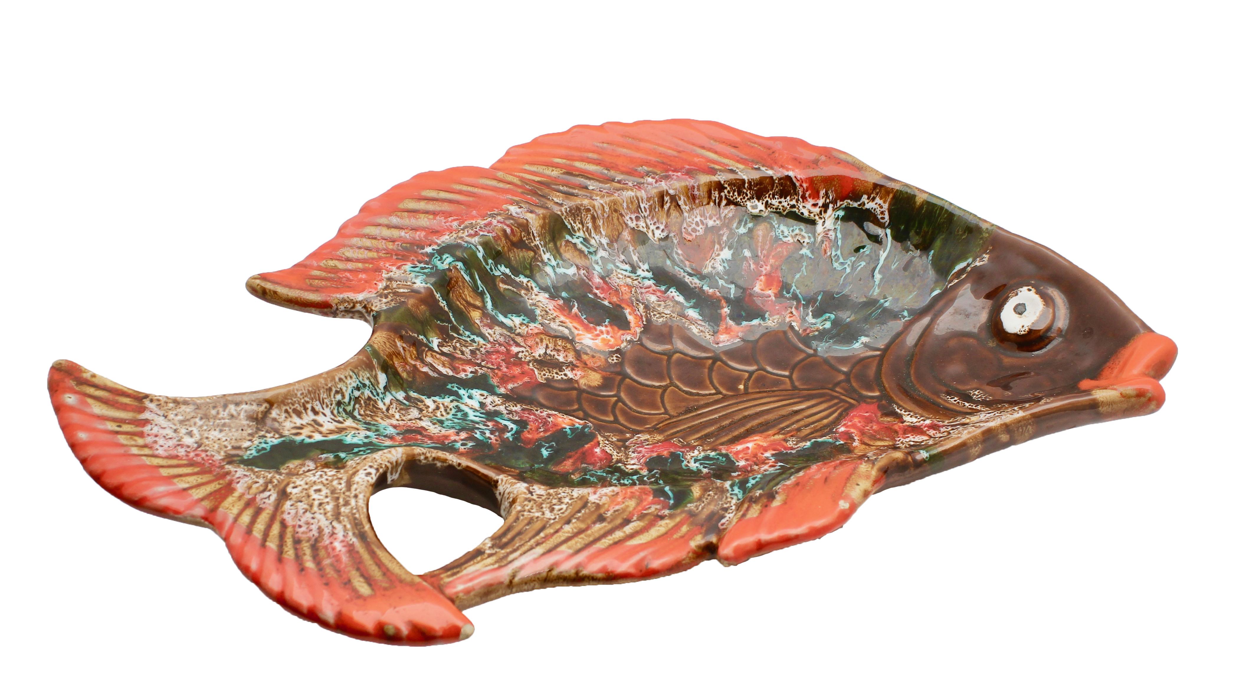 Large Vallauris (France) pottery ceramic, red and brown and green in color fish shape plate.

The piece is in good condition and a real beauty!
   























