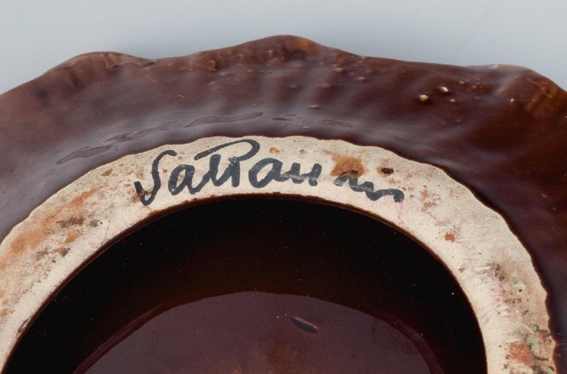 Mid-20th Century Vallauris, France, Two Shell-Shaped Bowls with Glaze in Shades of Brown and Red For Sale