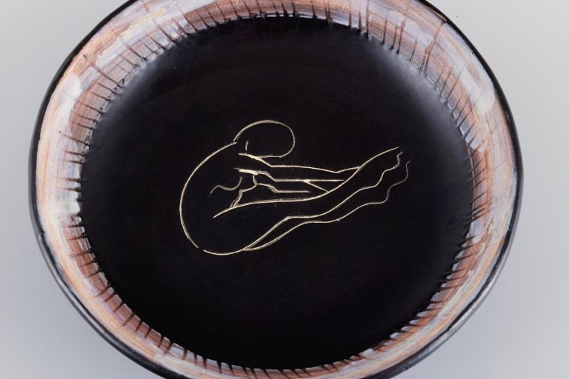 French Vallauris, France, Unique Ceramic Bowl in Black Glaze with Female Motif For Sale