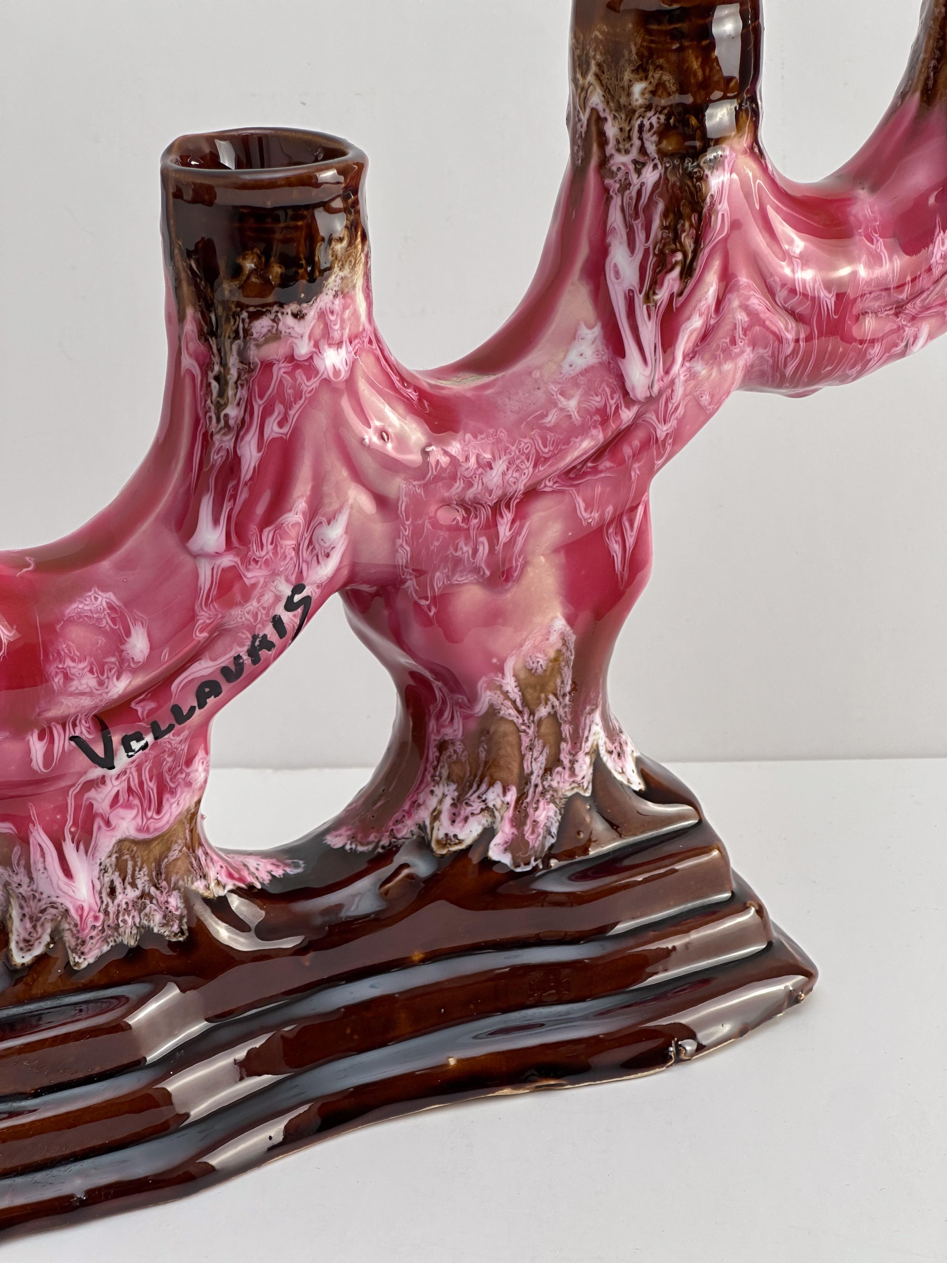 A vintage ceramic candelabra by the renowned French pottery makers Vallauris.

Handcrafted in the 1960s, this rare and distinctive piece reinterprets the traditional French candelabra in a bold mid-century, almost brutalist  style. 

Formed from