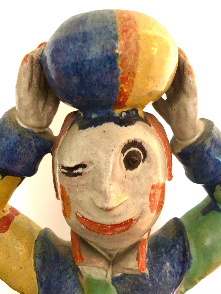 Circa 1928, Austria, a wonderful example of Secessionist pottery from one of the undisputed masters. Depicting a male harlequin figure. Wiener Werkstätte cipher, artists initials and model n.432 stamped to underside. Sold as sculpture, can be
