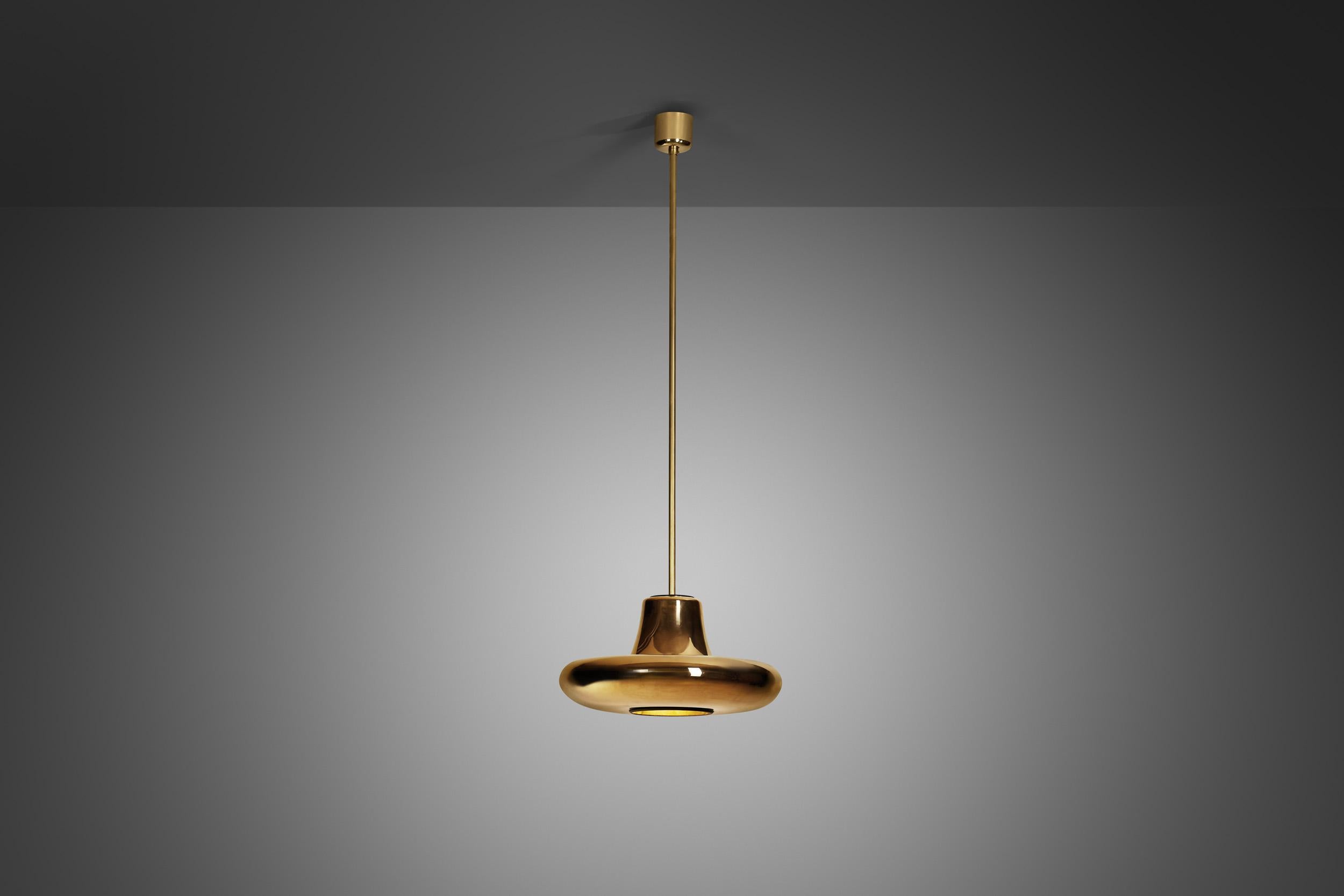 Valto Kokko was a multitalented Finnish designer and artist with a unique design language that translated into every single piece he created, exemplified by this rare futuristic gold-plated pendant lamp.

The 20th century, especially the second
