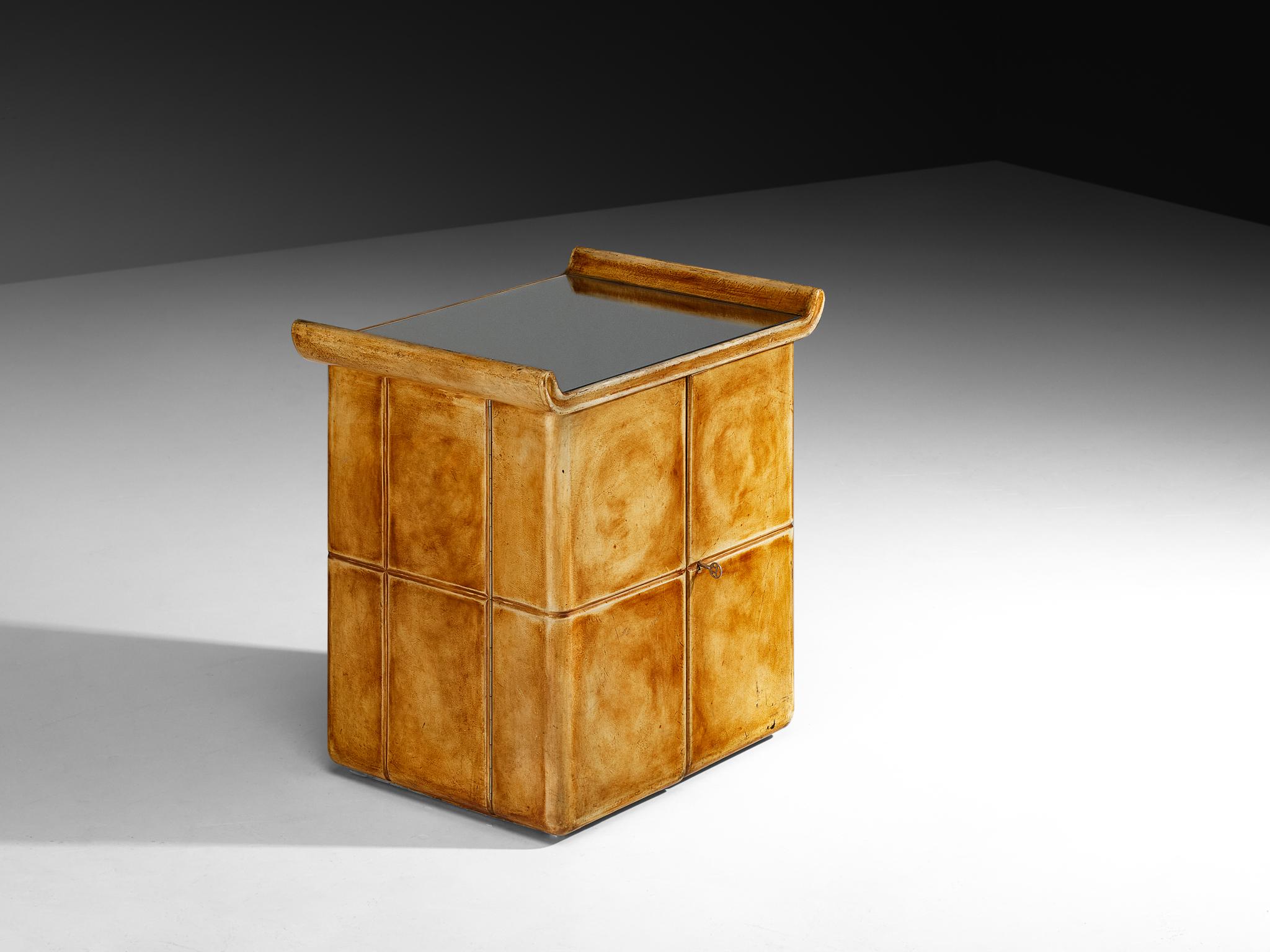 Valzania, small cabinet, parchment, black lacquered wood, mirror, brass, Italy, 1930s

This small cabinet by Valzania is an elegant example of Italian craftsmanship from the 1930s, where material and form come together in perfect balance. The