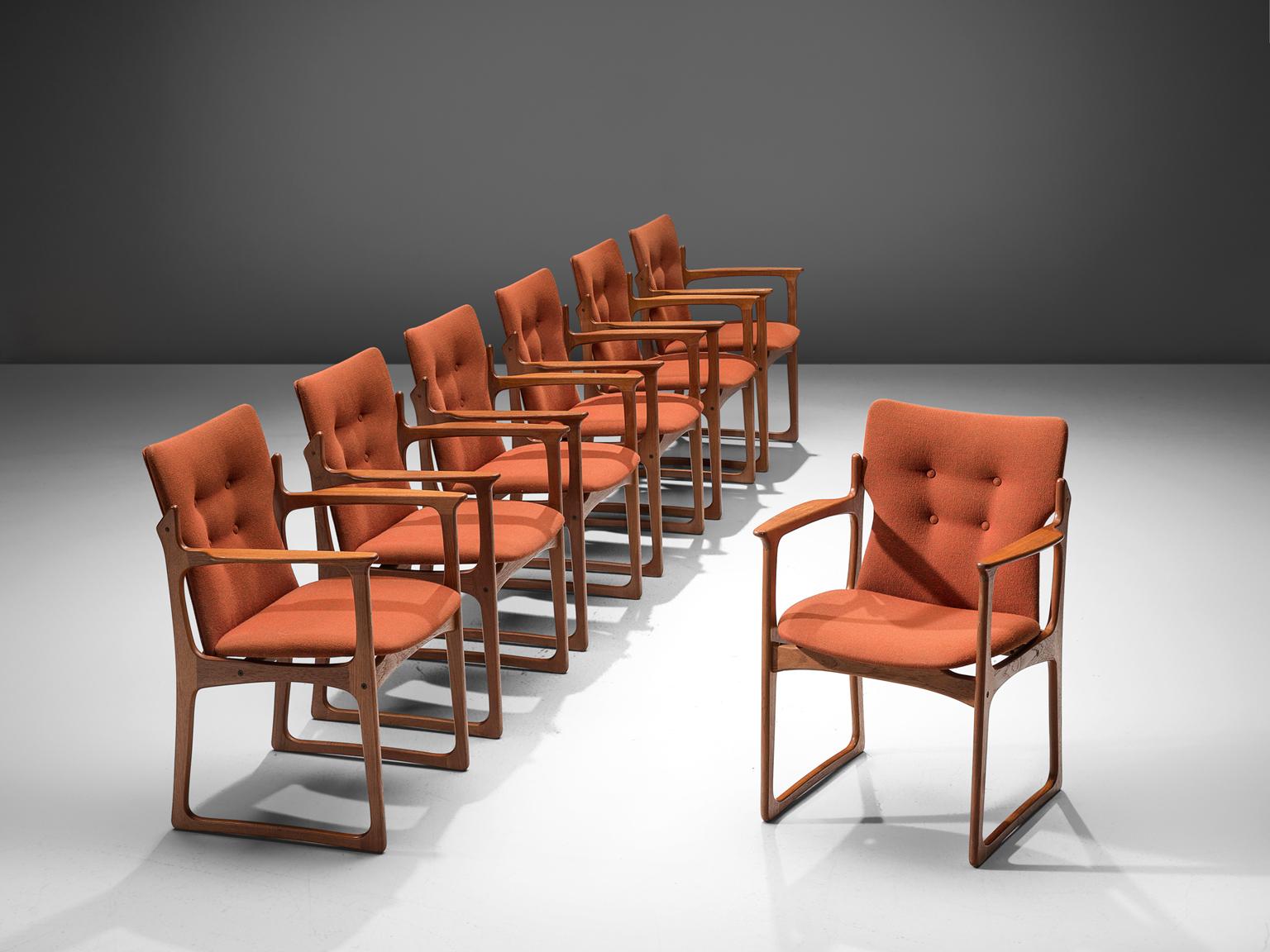 Vamdrup Stolefabrik, model 'VS 231', set of seven armchairs, teak and orange fabric, Denmark, 1960s. 

The armchairs with a solid teak frame, raise a handsome original orange upholstery seat. The frame shows subtle lines and beautiful curves of the