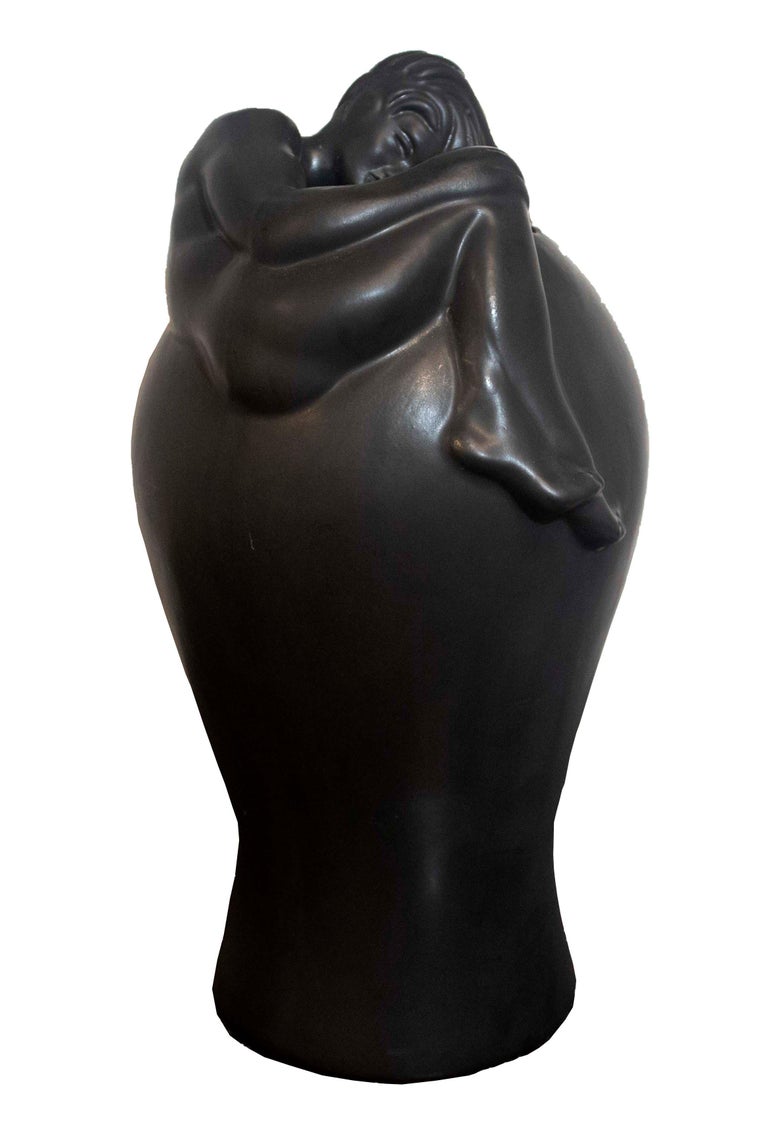 For your consideration is a marvelous vintage 1930s/1940s rare black ceramic vase with female nude design by Van Briggel. Dimensions: 16 height x 7.5 diameter. In excellent condition.
    