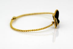 Van Cleef & Arpels, Vintage 18 Karat Gold and Onyx Butterfly Bangle with Diamond
