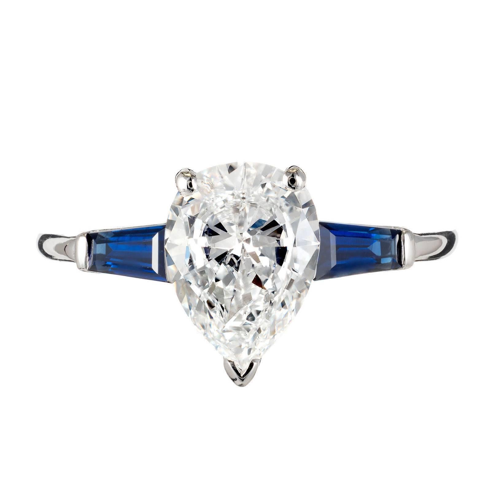 Van Cleef & Arpels 1960s fine pear shape Diamond and sapphire three-stone engagement ring. Platinum setting with blue Sapphire Baguettes. 

Platinum
1 pear Diamond, approx. total weight 1.40cts, E, VS2, GIA certificate #2155623989
2 tapered fine