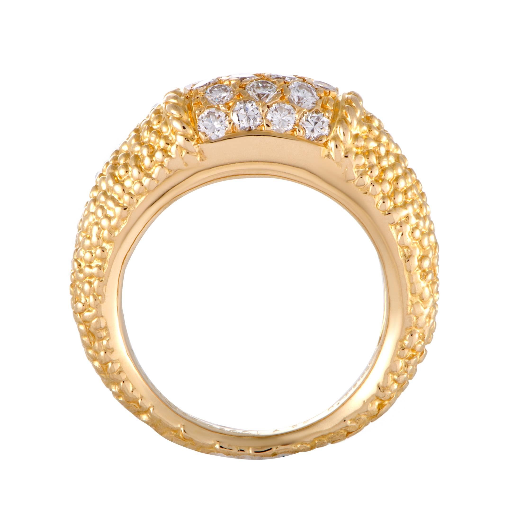 Splendid design and exquisite craftsmanship quality are combined in this 18K yellow gold ring into creating a piece of immense visual and aesthetic value. The ring is presented by Van Cleef & Arpels and embellished with 0.56 carats of scintillating