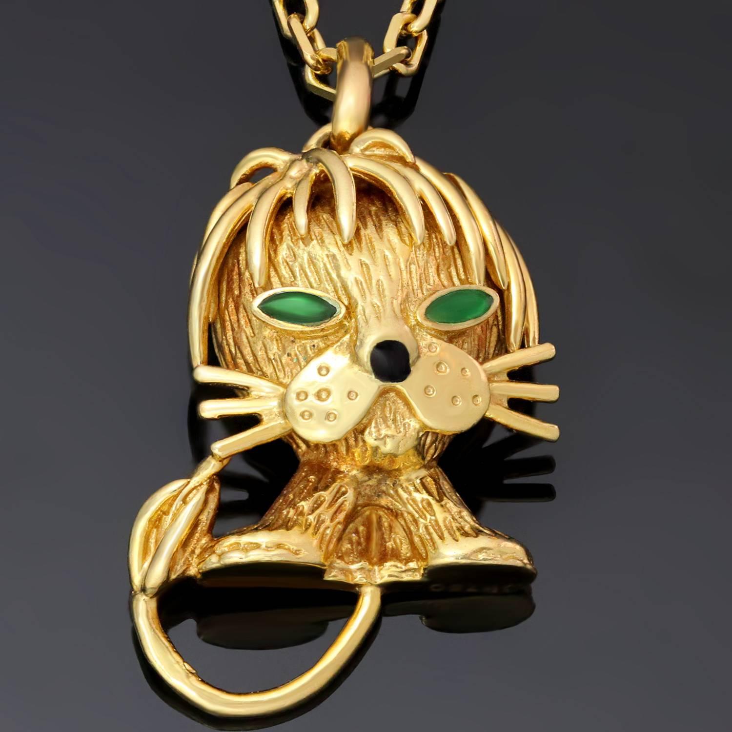 This iconic necklace from Van Cleef & Arpels features an adorable lion pendant crafted in 18k yellow gold and accented with green emerald eyes and a black jet nose. Made in France circa 1970s. Measurements: 0.59