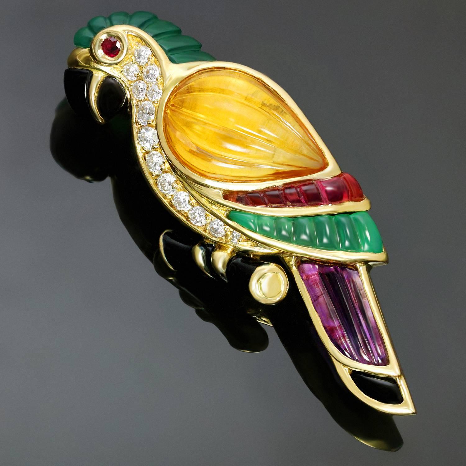 This stunning rare Van Cleef & Arpels brooch features a shape of a vibrant parrot bird crafted in 18k yellow features and set with brilliant-cut round diamonds, faceted ruby, amethyst, citrine, and pink and green tourmaline. Stamped with VCA maker's