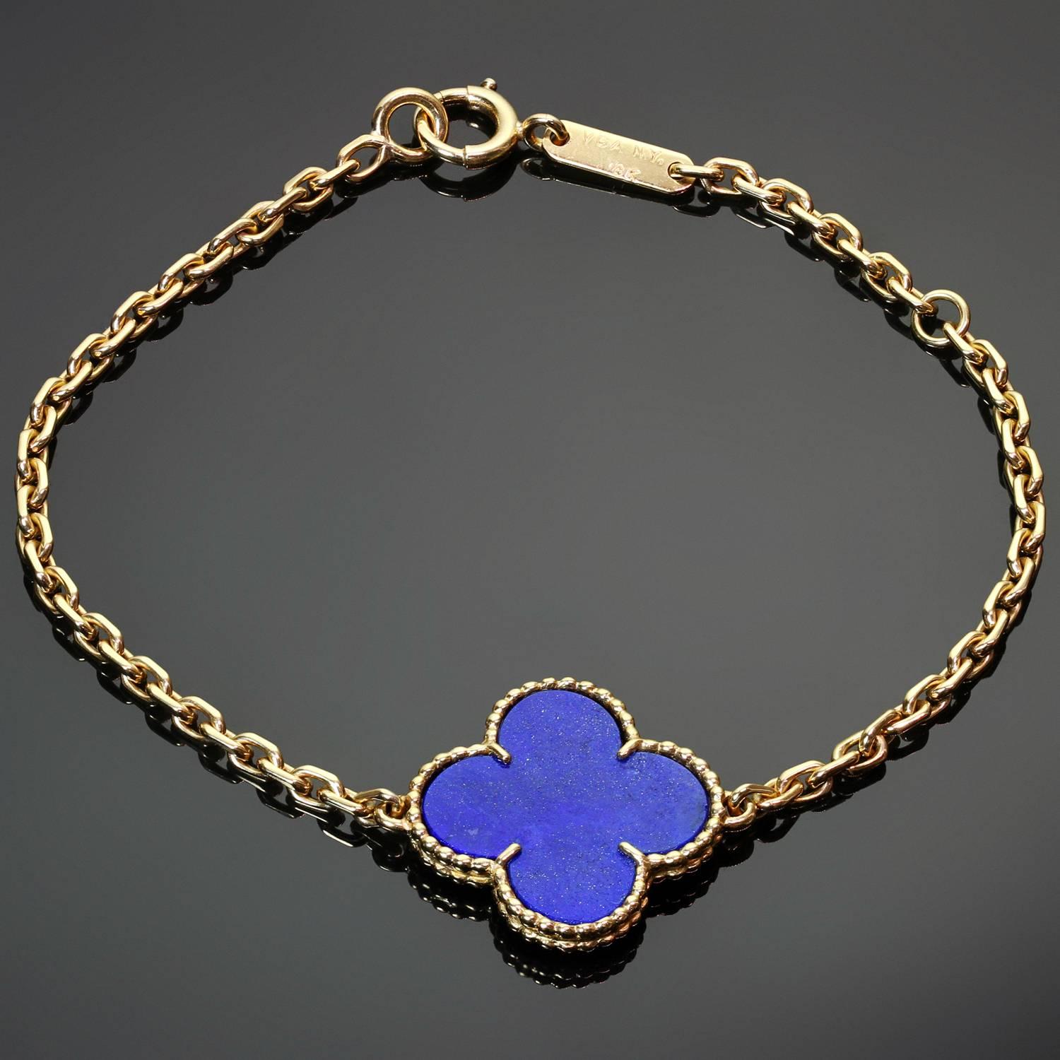 This rare Van Cleef & Arpels bracelet from the Magic Alhambra collection is crafted in 18k yellow gold and features a lucky clover charm beautifully inlaid with blue lapis lazuli. Made in France circa 1970s. Pre-owned. Shows some normal signs of