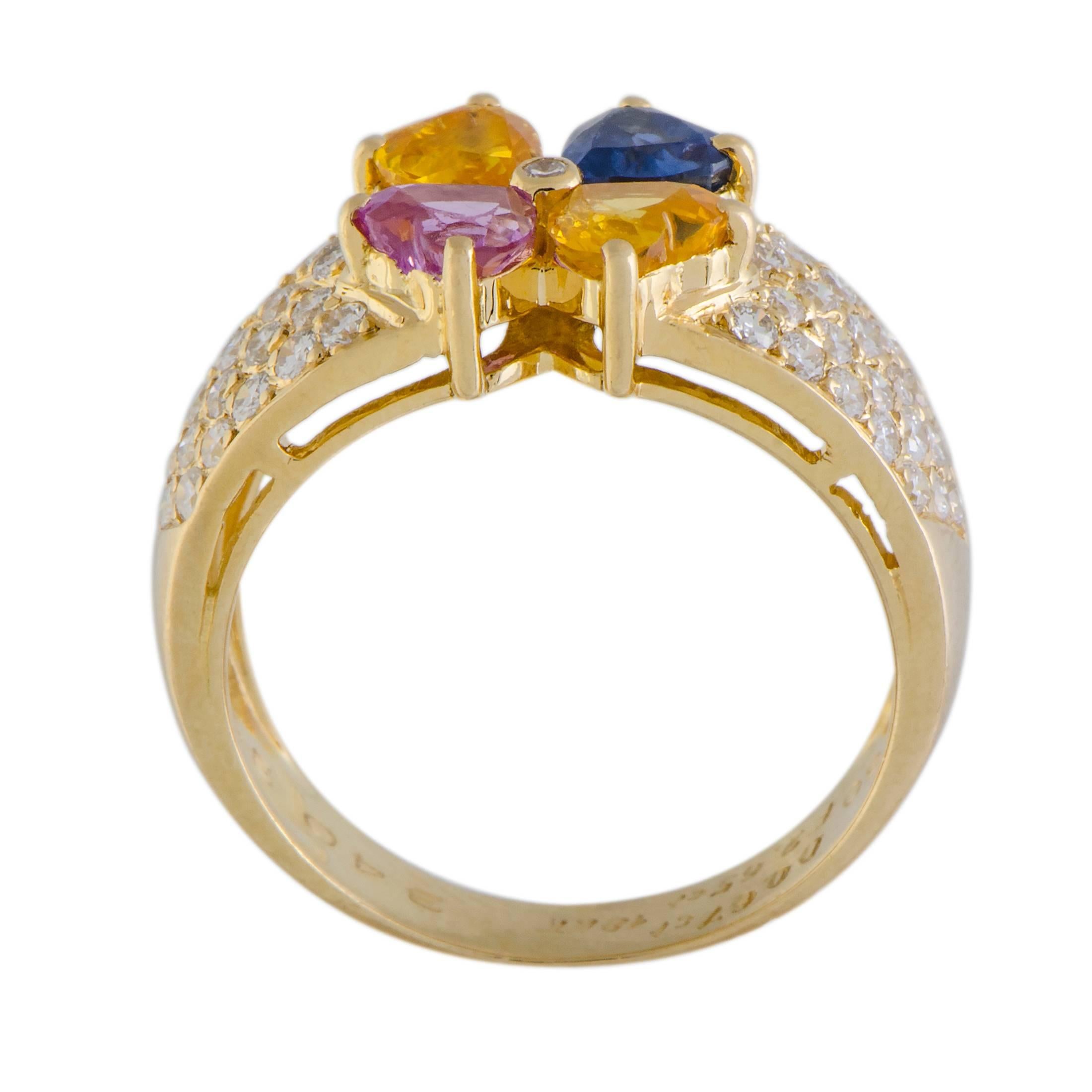 Presented by Van Cleef & Arpels, this fabulous ring from the renowned French jeweler is splendidly crafted from luxurious 18K yellow gold and boasts a stunningly sumptuous décor. The ring is set with sparkling diamonds and colorful sapphires that