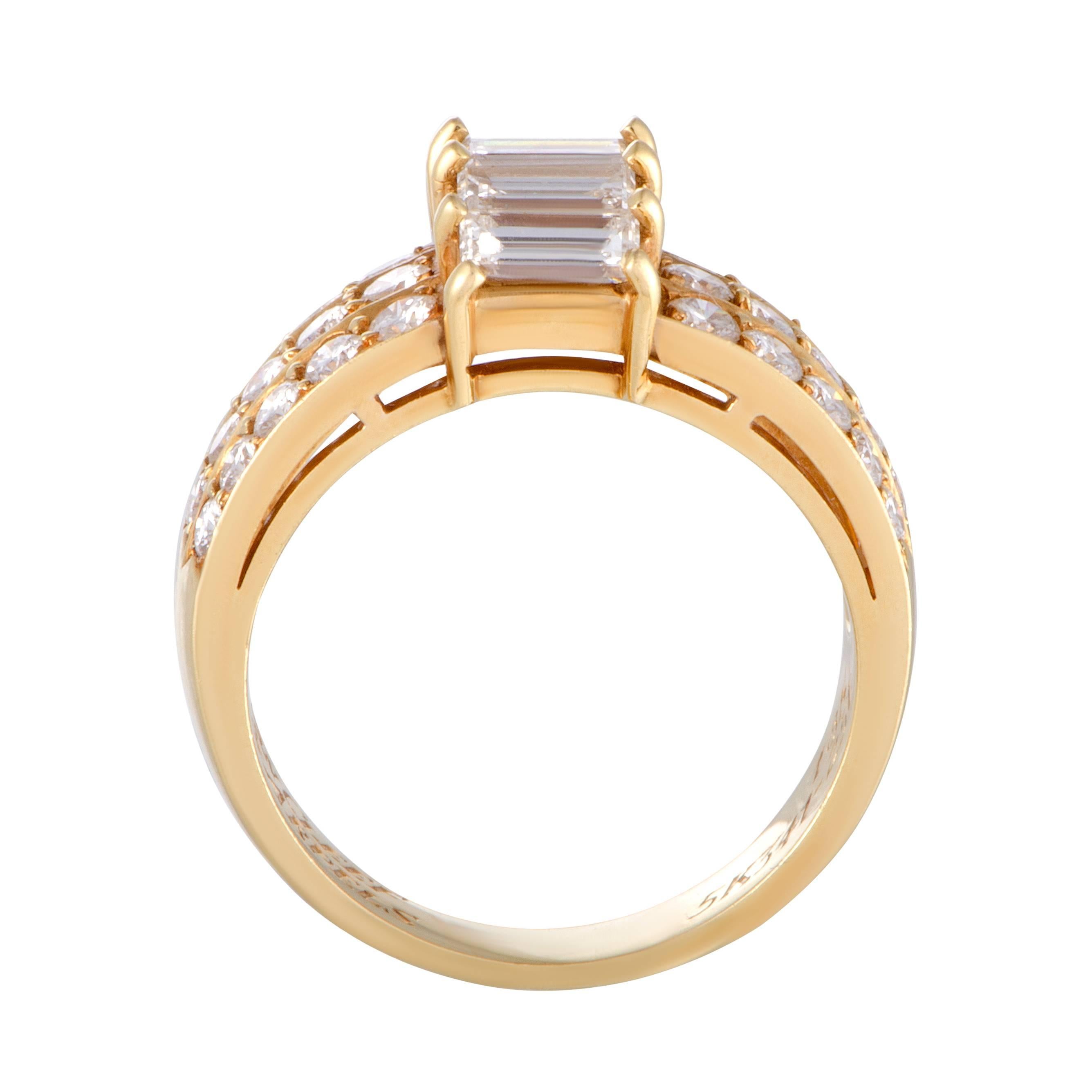 Exquisitely crafted from the ever-luxurious 18K yellow gold and lavishly set with glamorously resplendent diamond stones, this spectacular ring exudes extravagance and refinement. The ring is a Van Cleef & Arpels design and boasts a total of