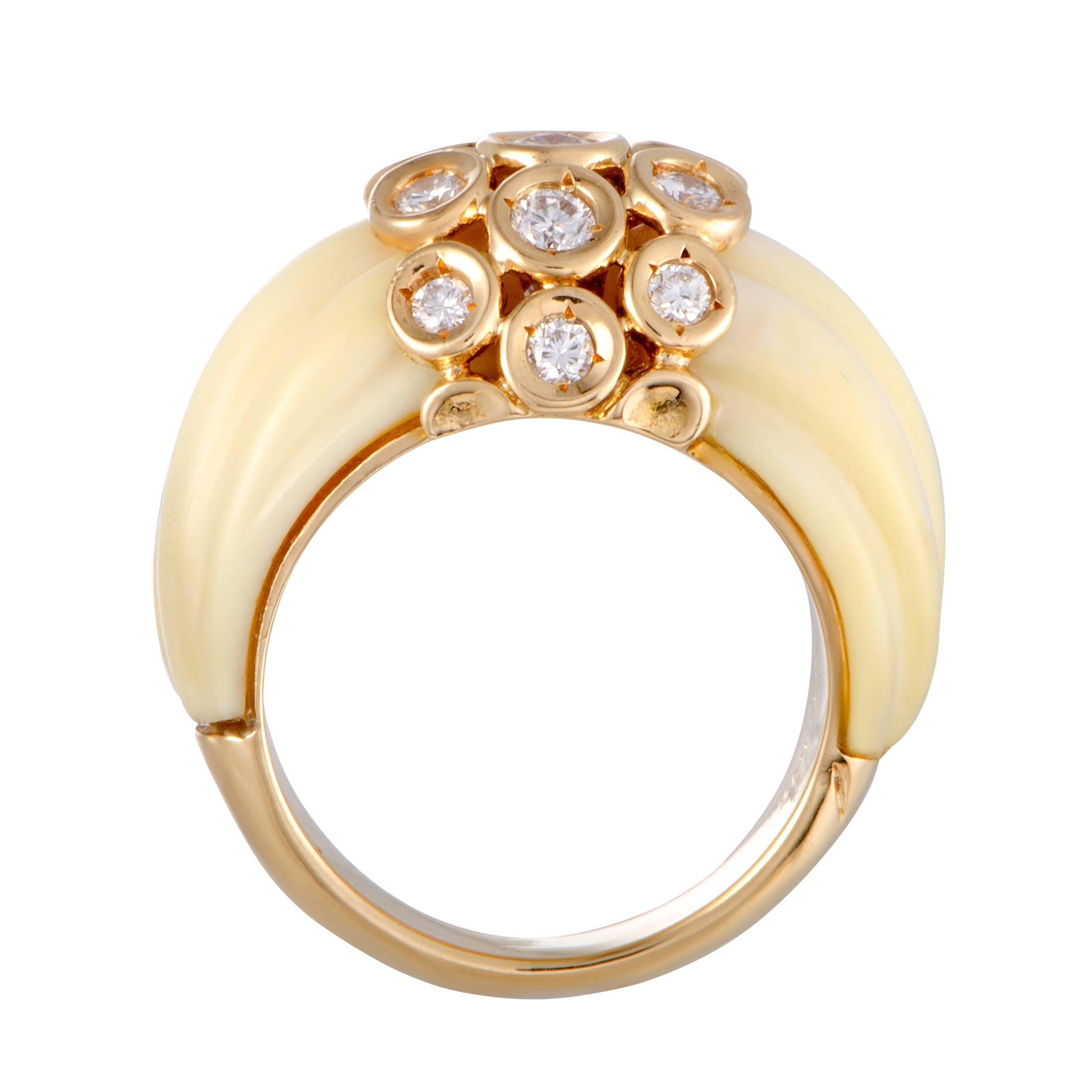 The scintillating diamond stones and the splendid white coral lend their sublime aesthetic appeal to this gorgeous ring designed by Van Cleef & Arpels that exudes charm and elegance. The ring is crafted from 18K yellow gold and boasts a total of