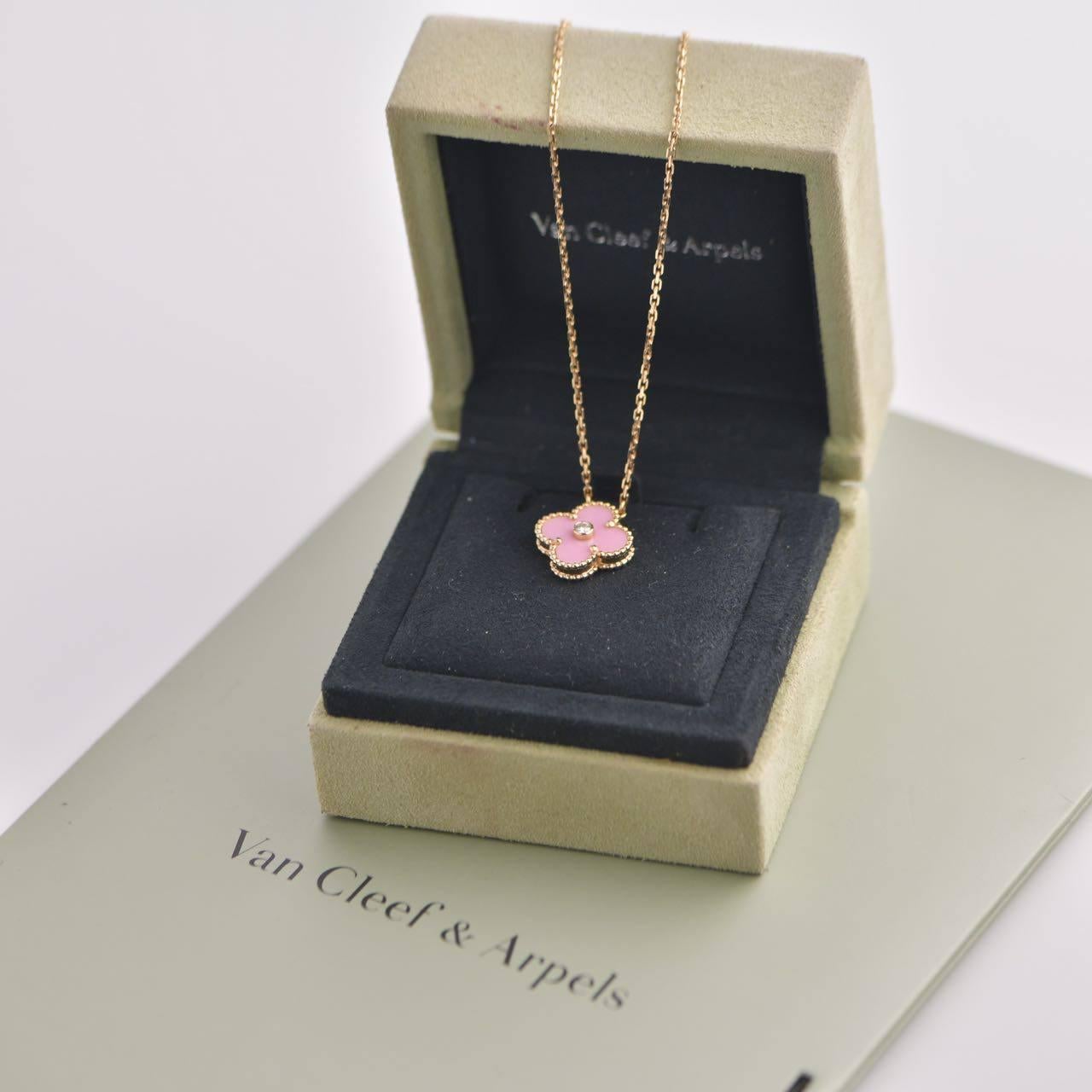 Limited edition released in 2015 as the holiday pendant, rhodonite stone, made in 18k rose gold, VCA doesn't create this version anymore, truly a collective piece!

SKU: AT-1550
Brand:  Van Cleef & Arpels
Model.  VCARO5SY00
Serial No. 