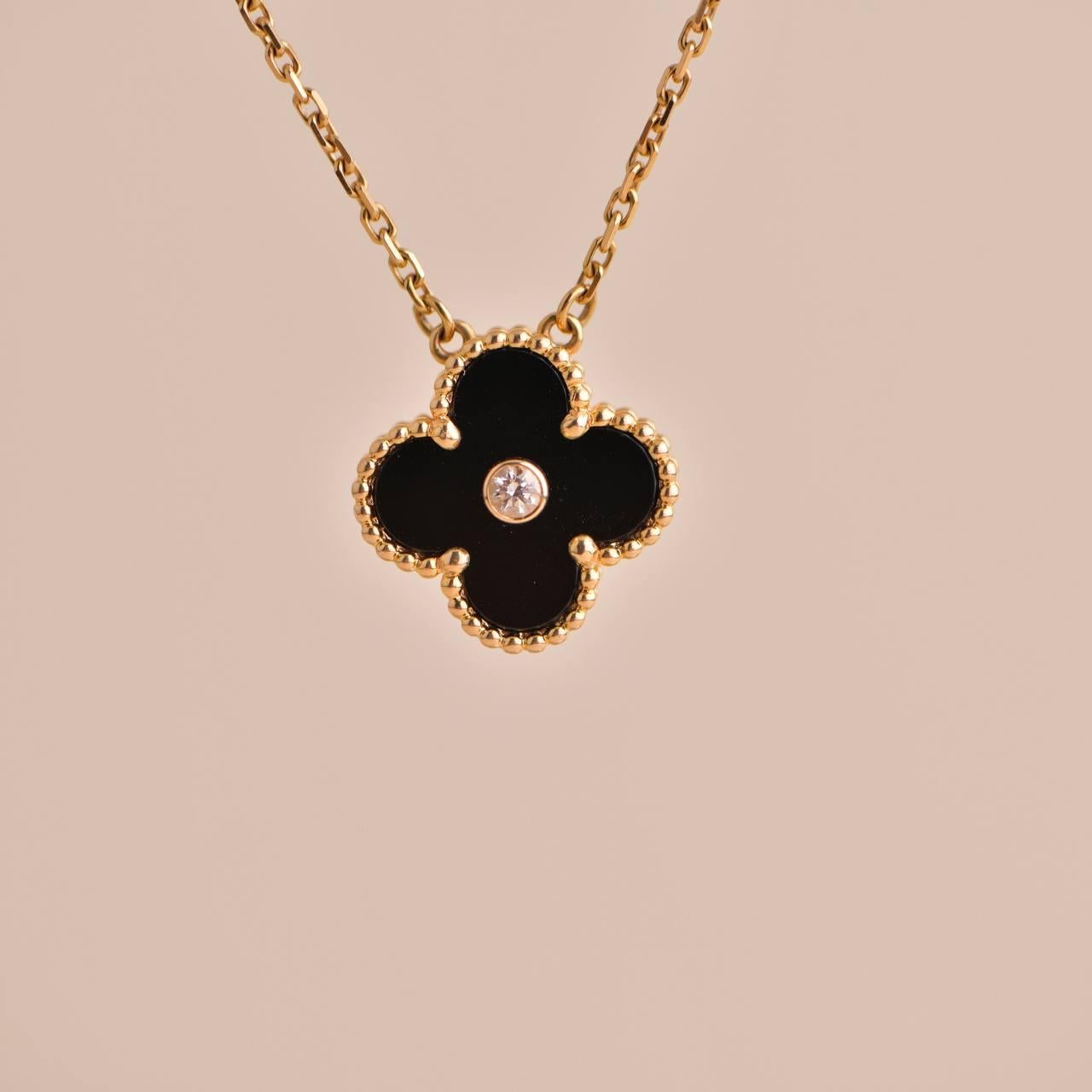 Van Cleef Alhambra 2016 Holiday Diamond Onyx Pendant Necklace In Excellent Condition In Banbury, GB