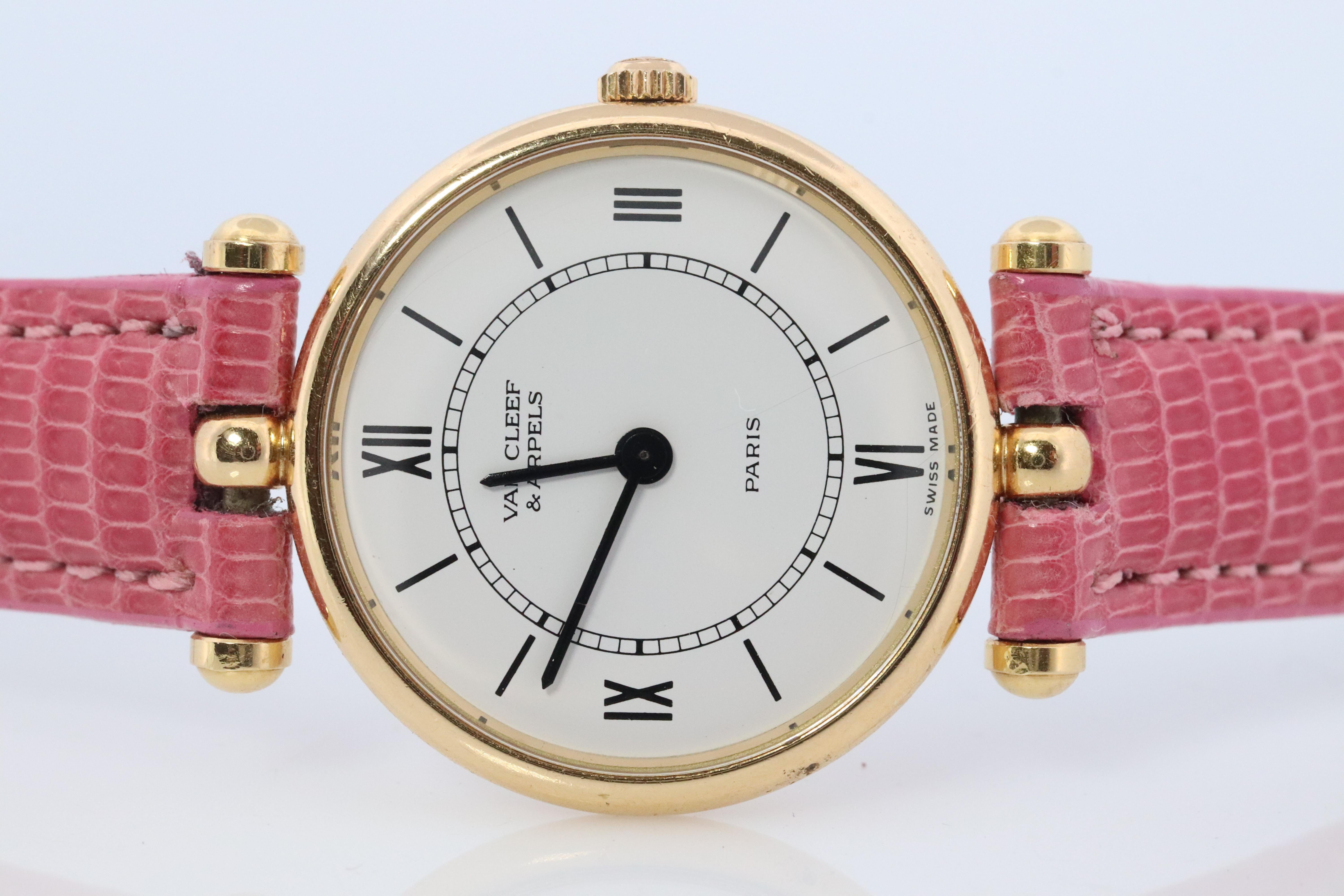 Genuine Van Cleef & Arpels Watch
Classic or Classique Ladies
ref. 18601

18k Yellow Gold Case.

Condition: Shows little to no wear.

Comes with genuine Ecclissi leather band.
New battery installed and Serviced.

Details:
24mm round case
18k Yellow