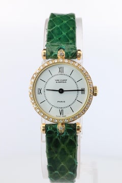 Van Cleef and Arpels 18901 B1 watch. 18k Gold VCA Classique Diamond Bezel.
