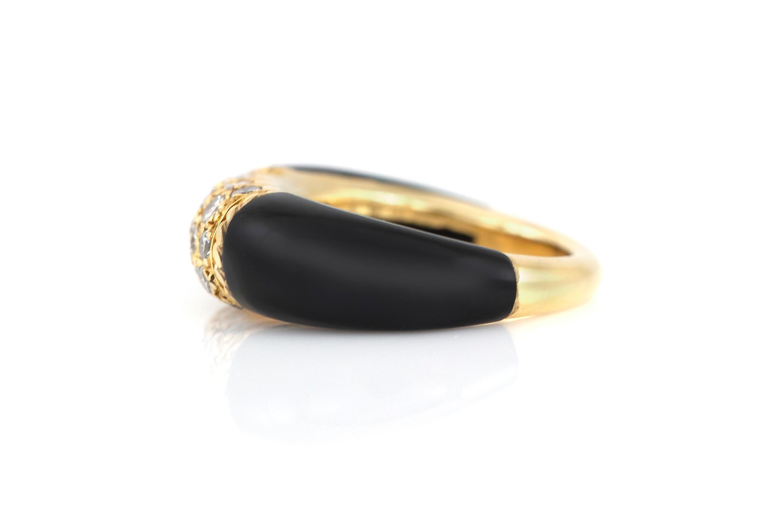 Finely crafted in 18k yellow gold with black onyx and round brilliant cut diamonds weighing approximately a total of 0.50 carat.
Signed by Van Cleef & Arpels
Size 3 1/4
We also have the same model available with Coral and Diamonds, size 5 3/4