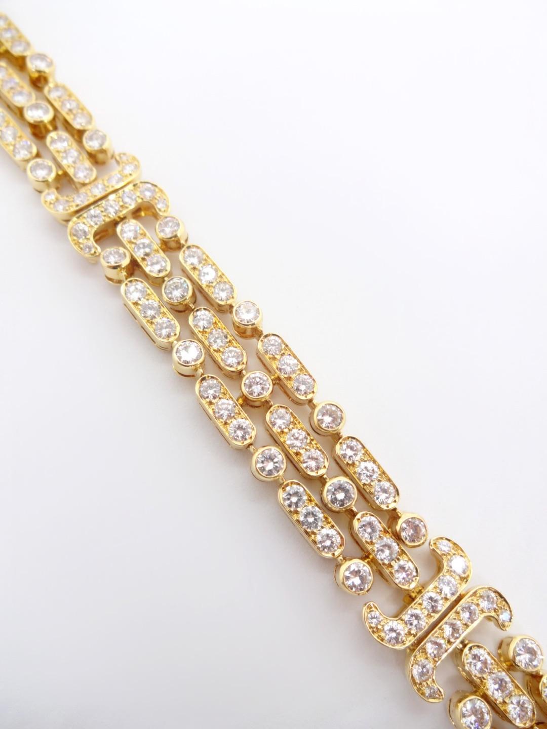 Contemporary Van Cleef & Arpels 18 Karat Gold and Diamond Bracelet, Signed and Numbered For Sale