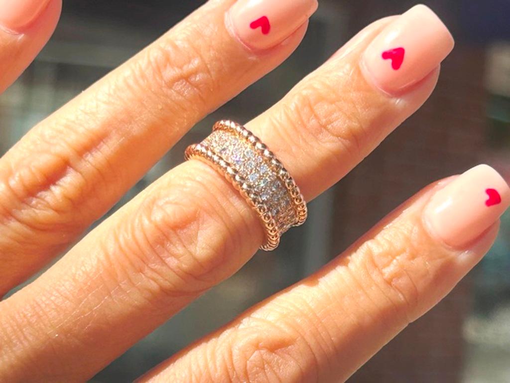 The round, sparkling diamonds line the golden ribbon of Perlee' diamond creations. The natural beauty of the precious stones enters into a dialogue with the brilliance of the golden beads that border each piece! 
 Comes with original inner and outer