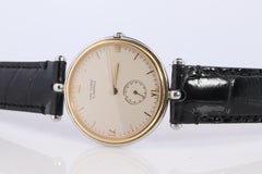 Van Cleef and Arpels 415 104 watch. La Collection 18k SS Round 32mm Watch