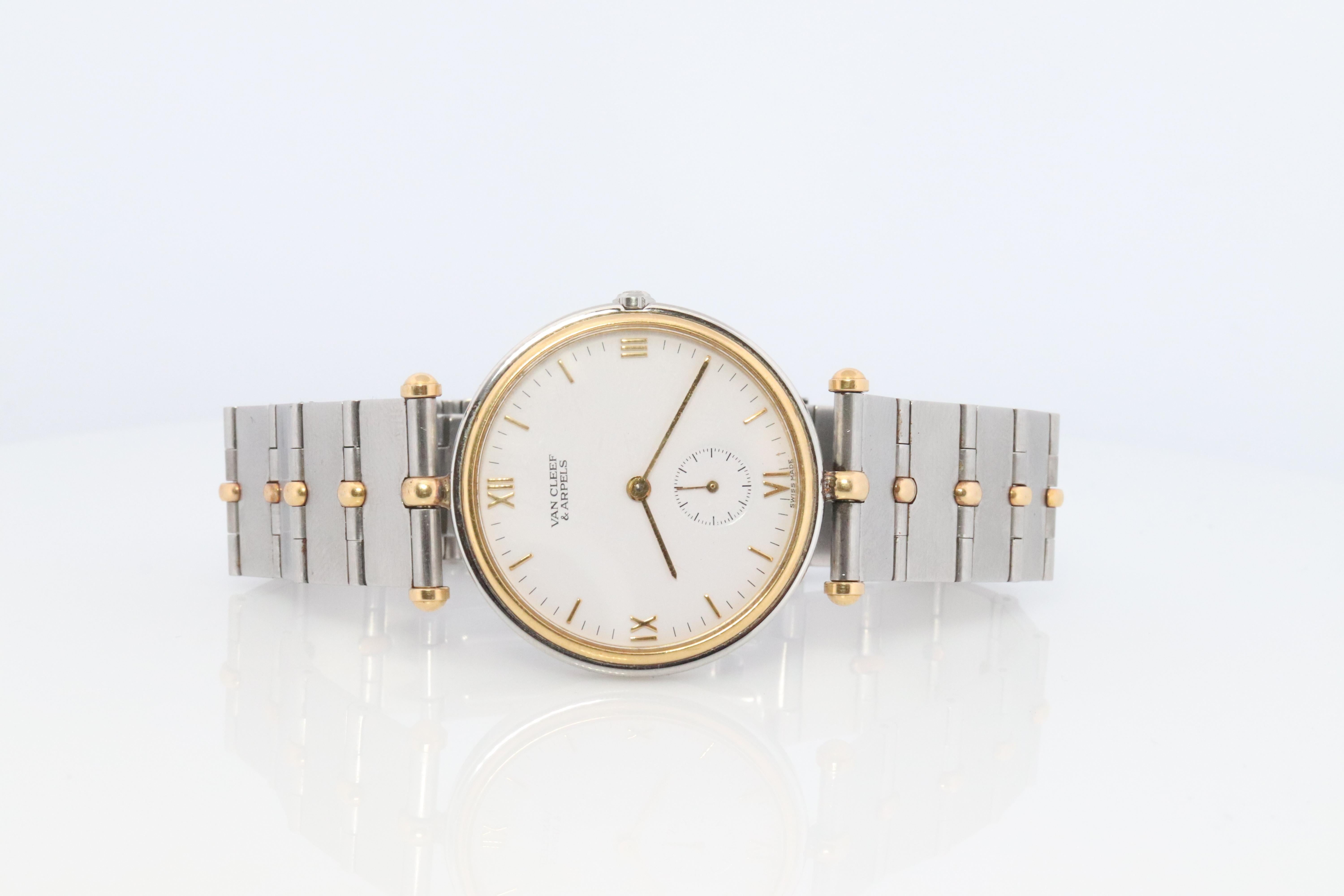 Genuine Van Cleef & Arpels Watch
La Collection Round 
Ref 416.604.B4

18k Yellow Gold with Stainless Steel Case and Bracelet

Condition: Shows some wear. Will come in generic box. Has some significant scratching on the back cover.


New battery