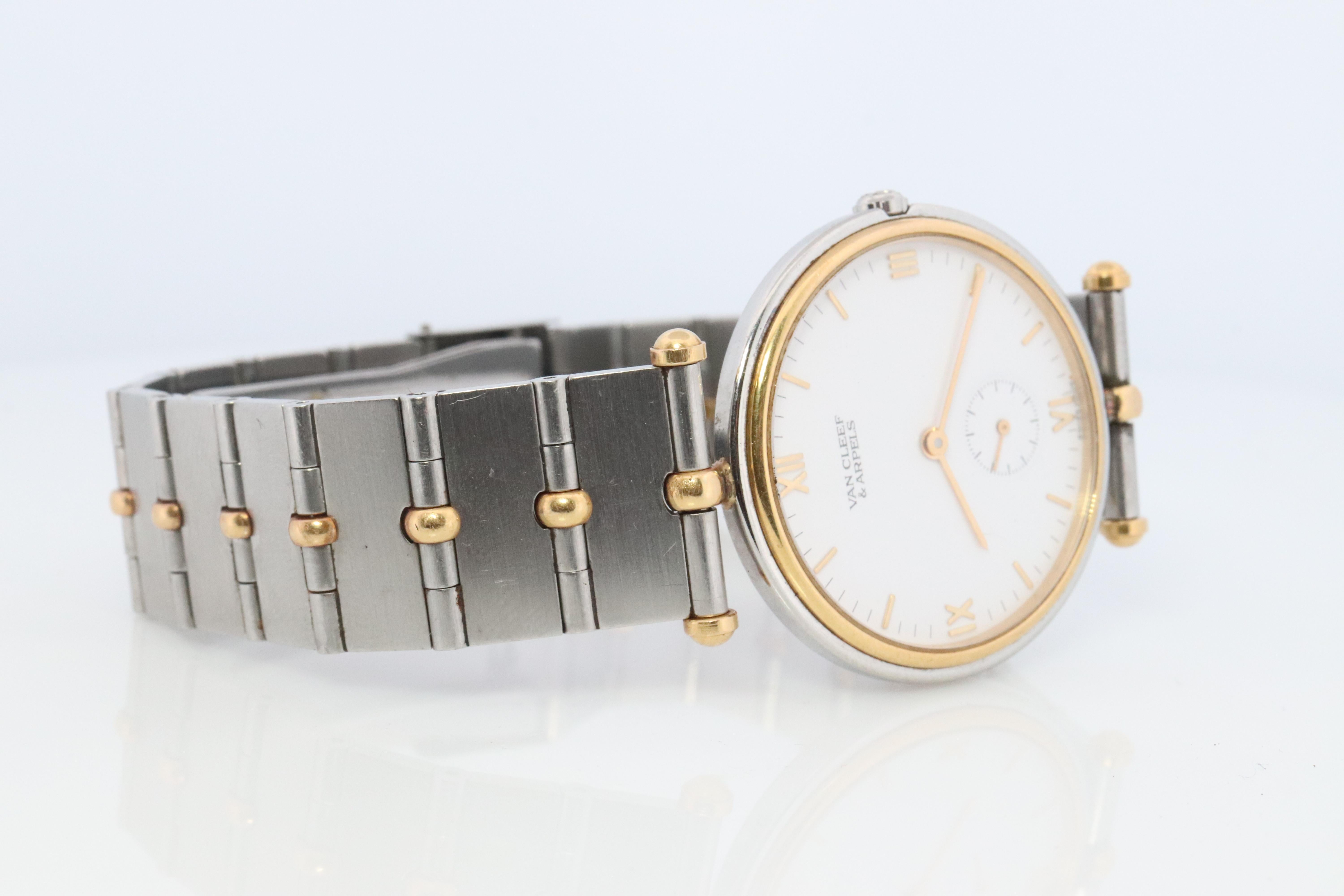 Van Cleef and Arpels 416 604 B4 watch. La Collection 18k SS Round 32mm Watch In Good Condition For Sale In Port Charlotte, FL