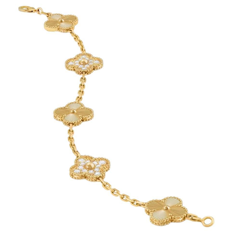 Van Cleef and Arpels 5 motif bracelet in guilloche gold and diamonds