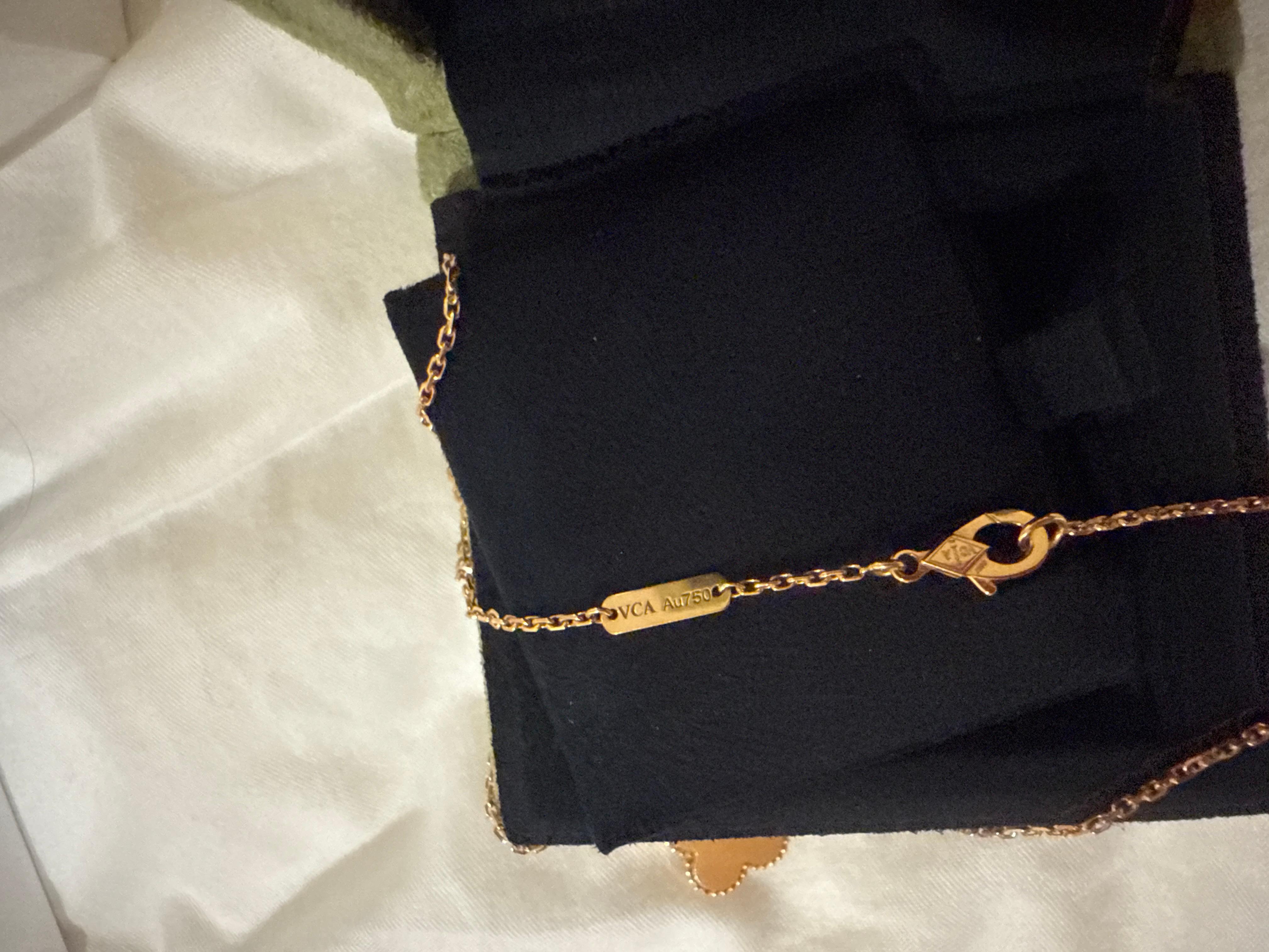 Van Cleef and Arpels Alhambra Holiday Diamond Onyx Pendant Necklace In Excellent Condition For Sale In London, England