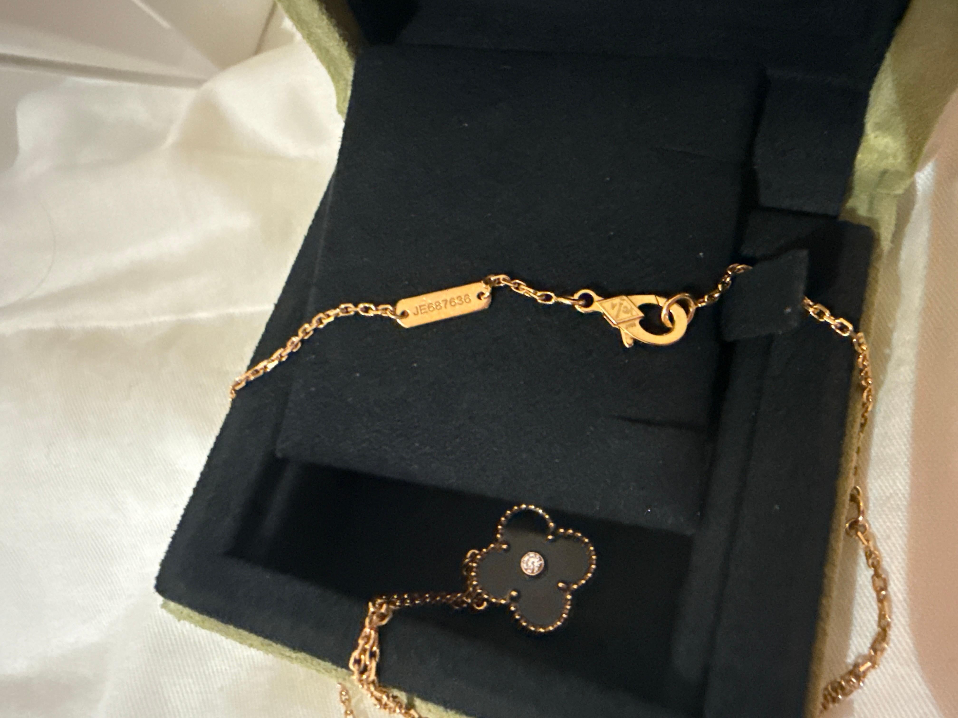 Women's or Men's Van Cleef and Arpels Alhambra Holiday Diamond Onyx Pendant Necklace For Sale