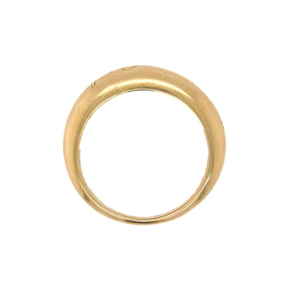 VC&A domed narrow 18K gold band engraved 'Van Cleef & Arpels' along the top.  The ring measures 5/8